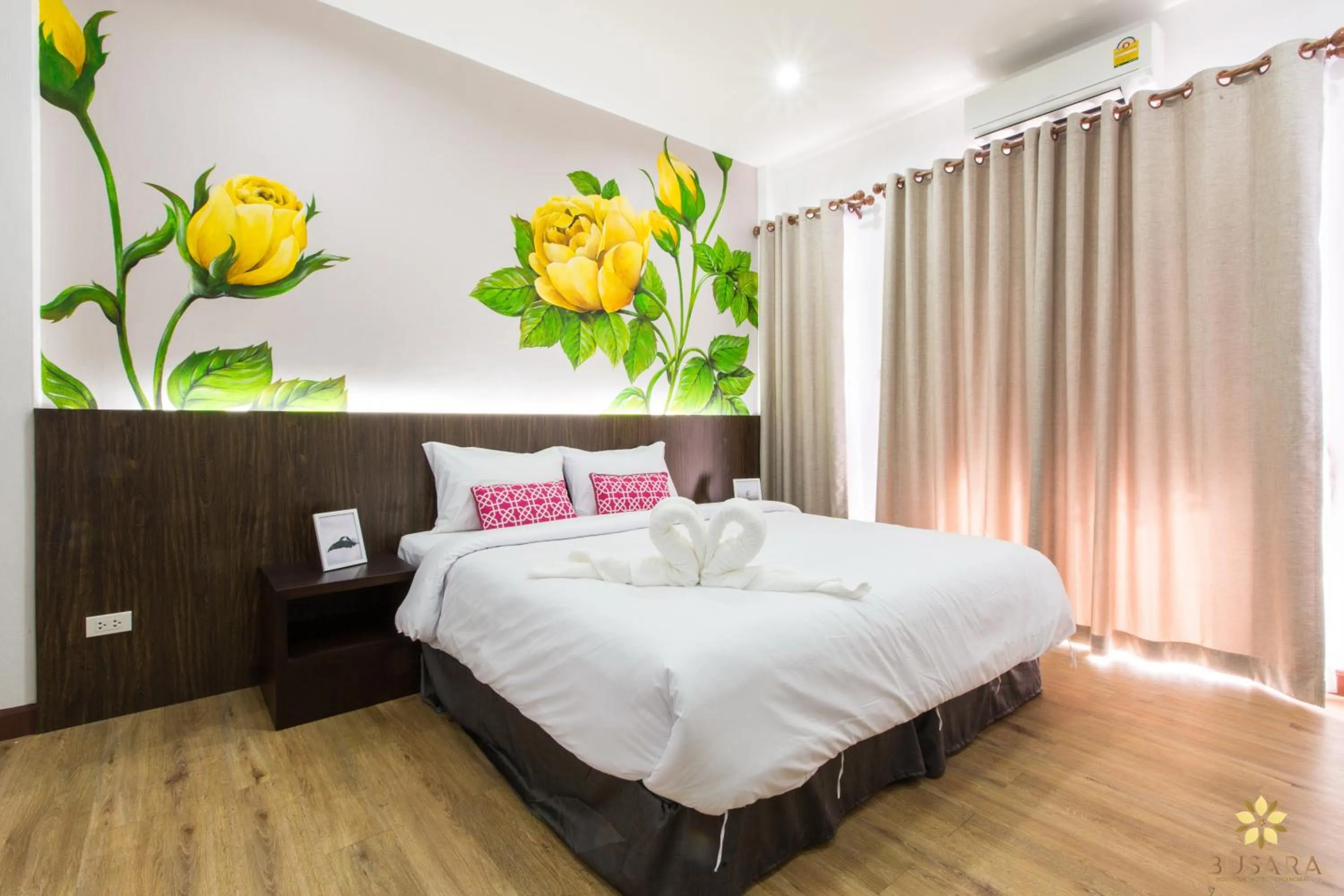 Bed in Busara Hotel Chiangmai