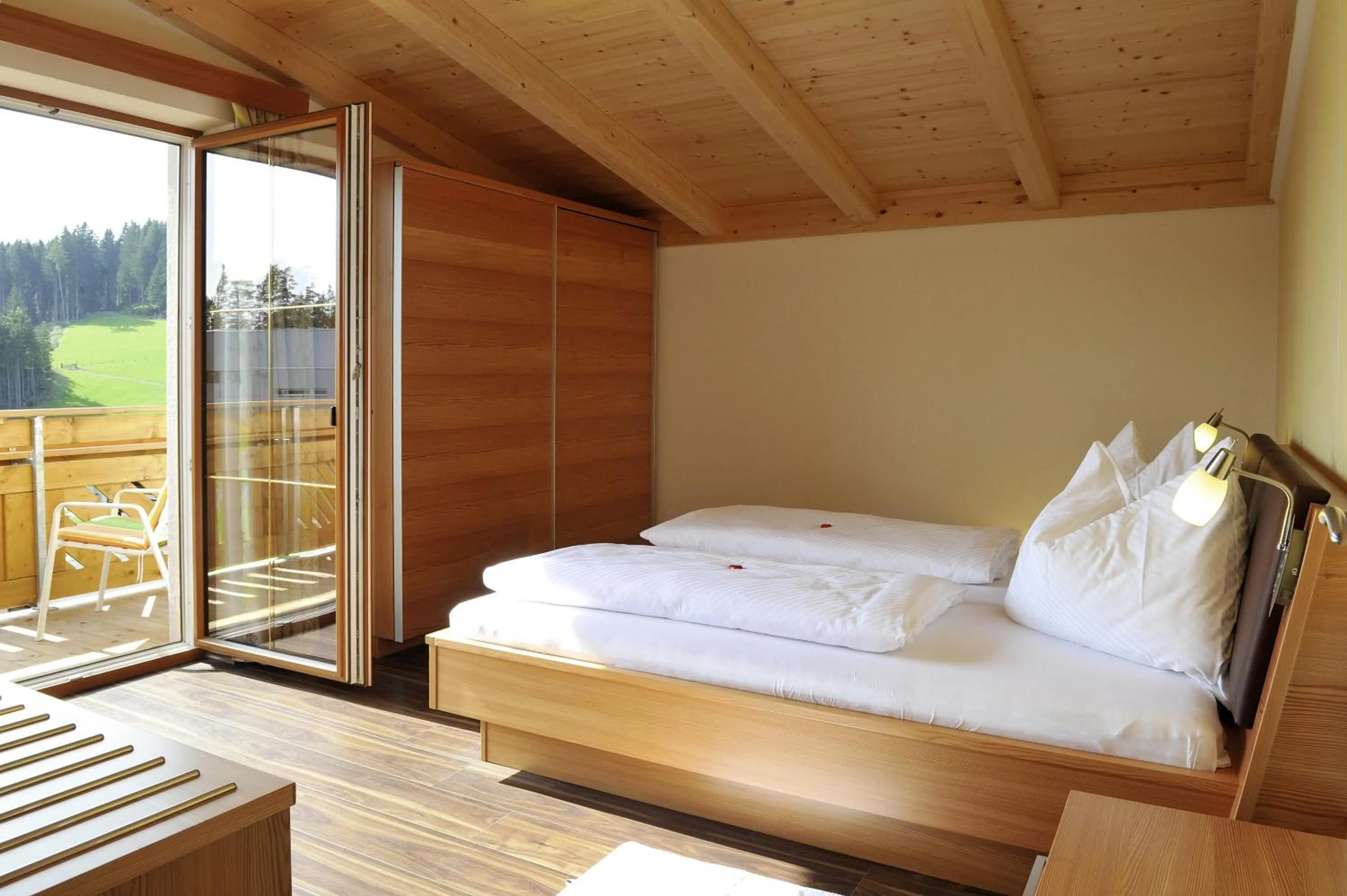 Photo of the whole room, Bed in Familienhotel Moos-Alm