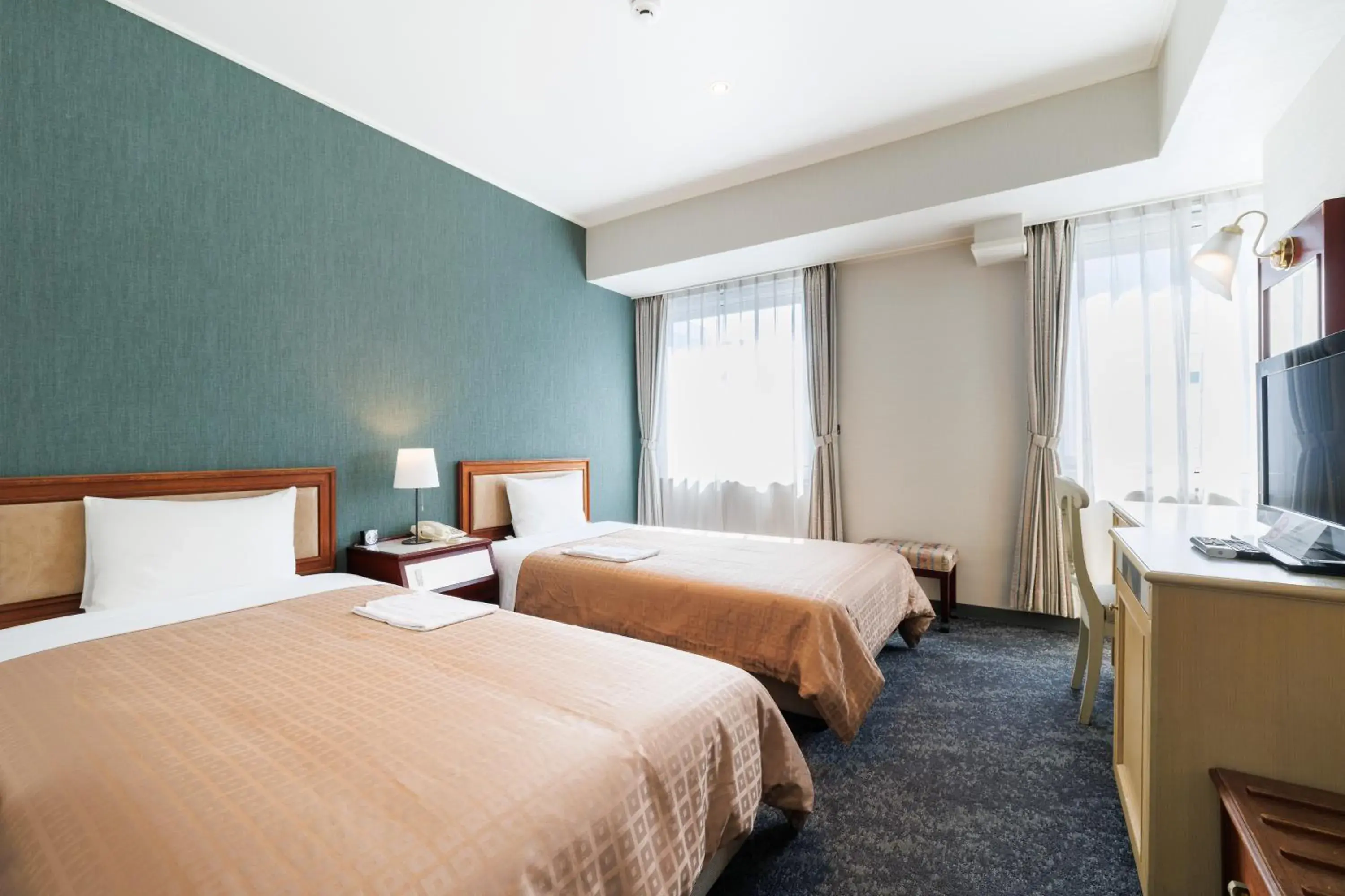 Bed in Hiroshima Intelligent Hotel Annex Bed in Hiroshima Intelligent Hotel Annex