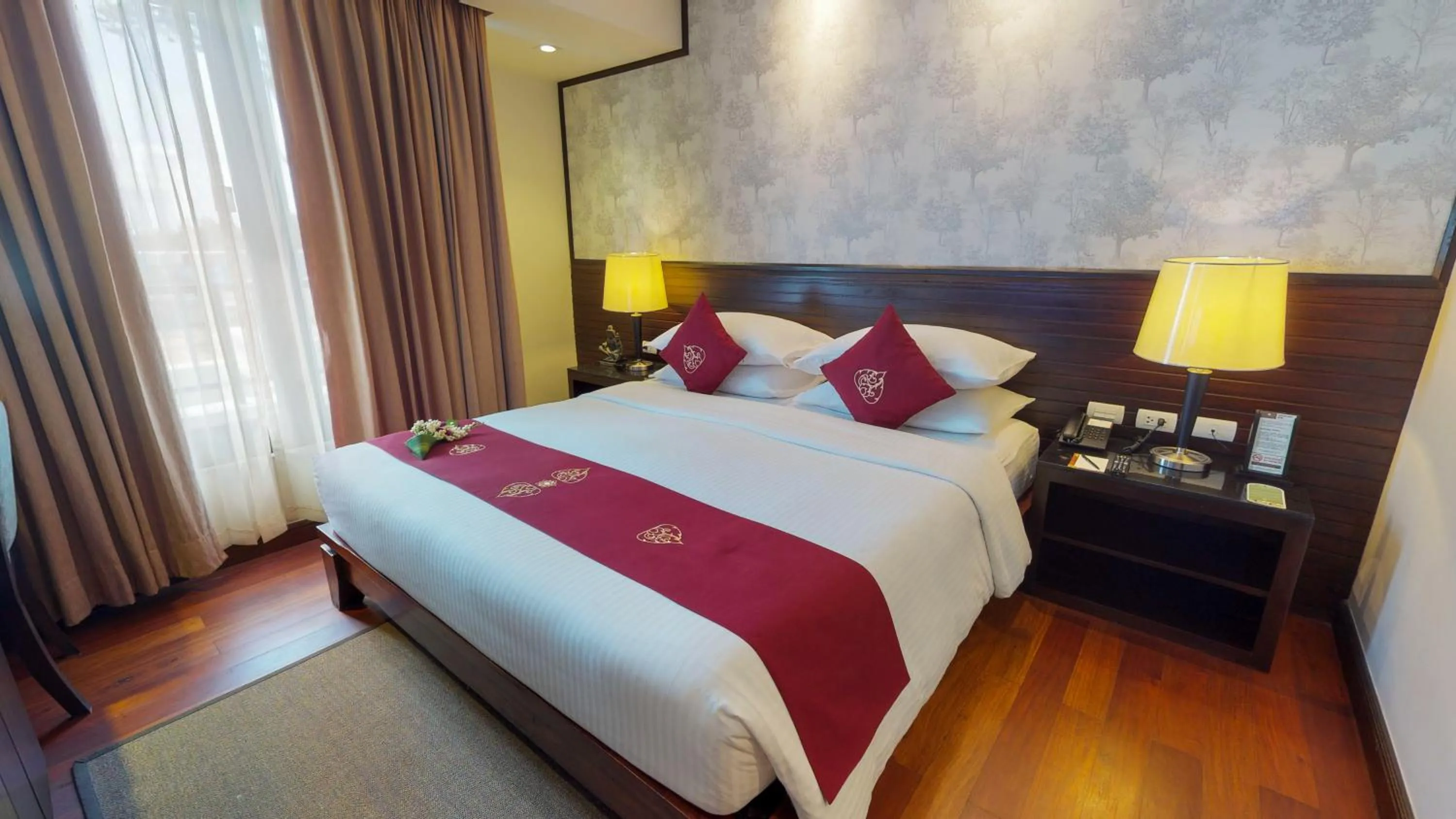 Bed in Tara Angkor Hotel