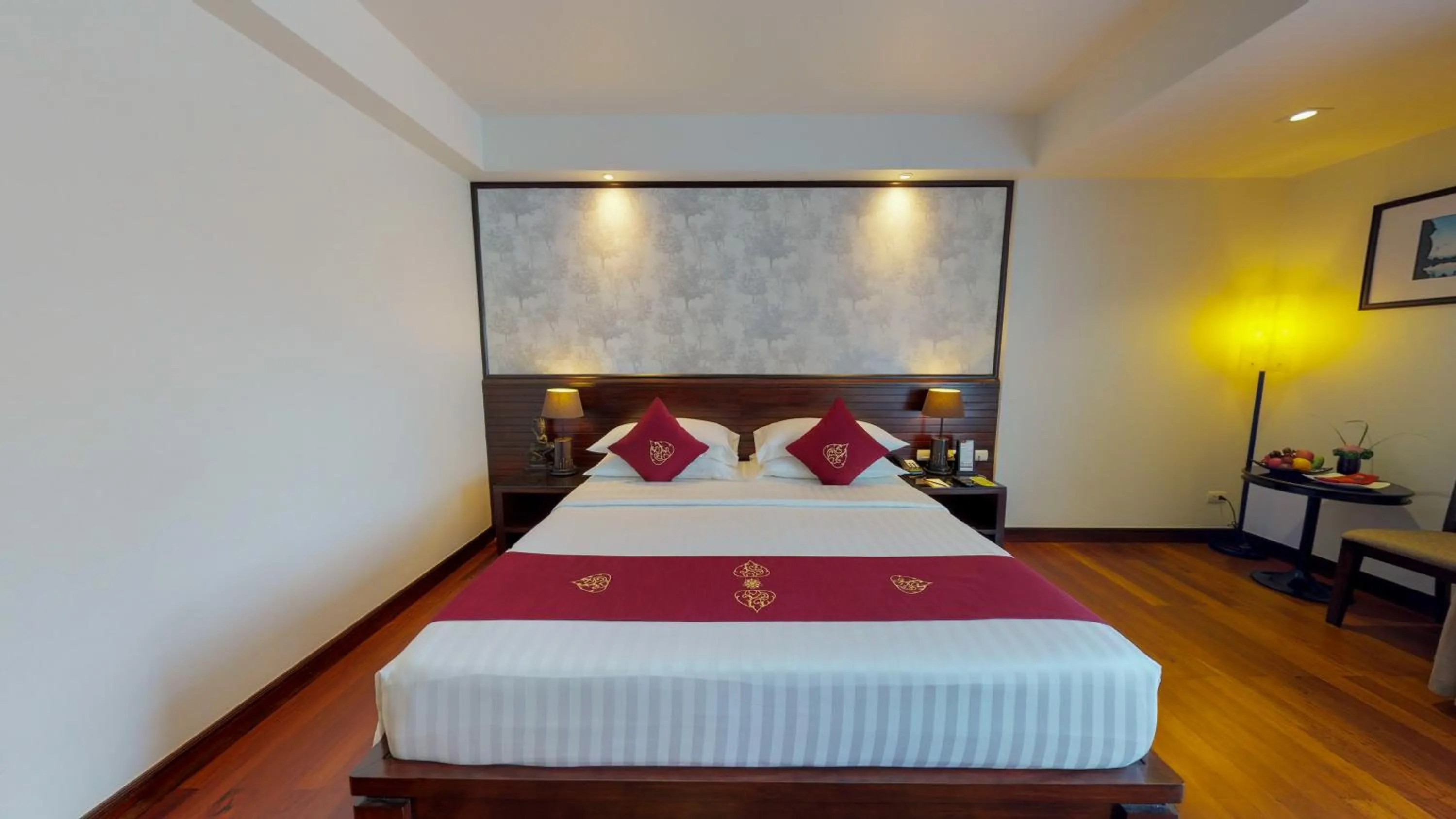 Bed in Tara Angkor Hotel