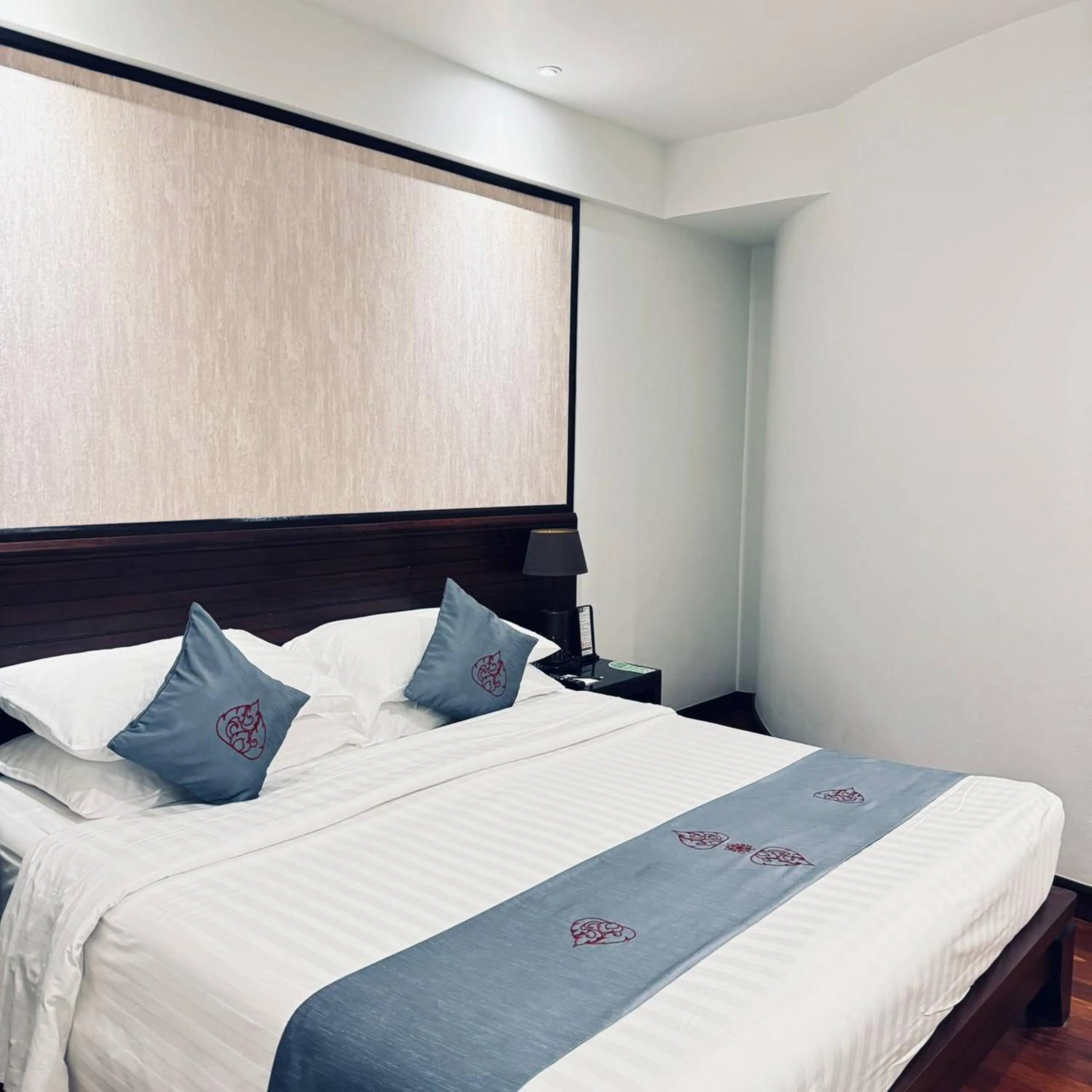 Bed in Tara Angkor Hotel