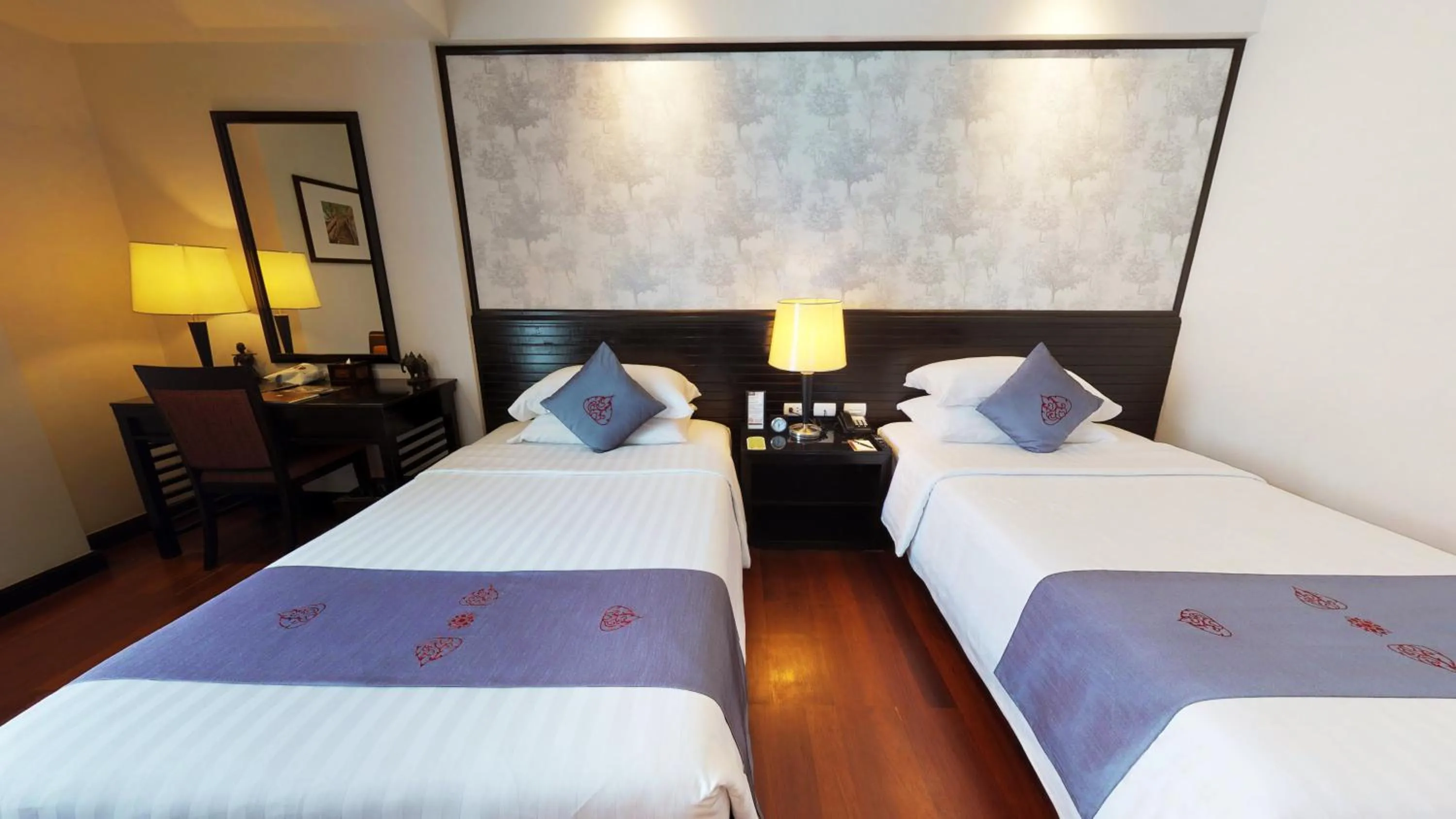 Bed in Tara Angkor Hotel