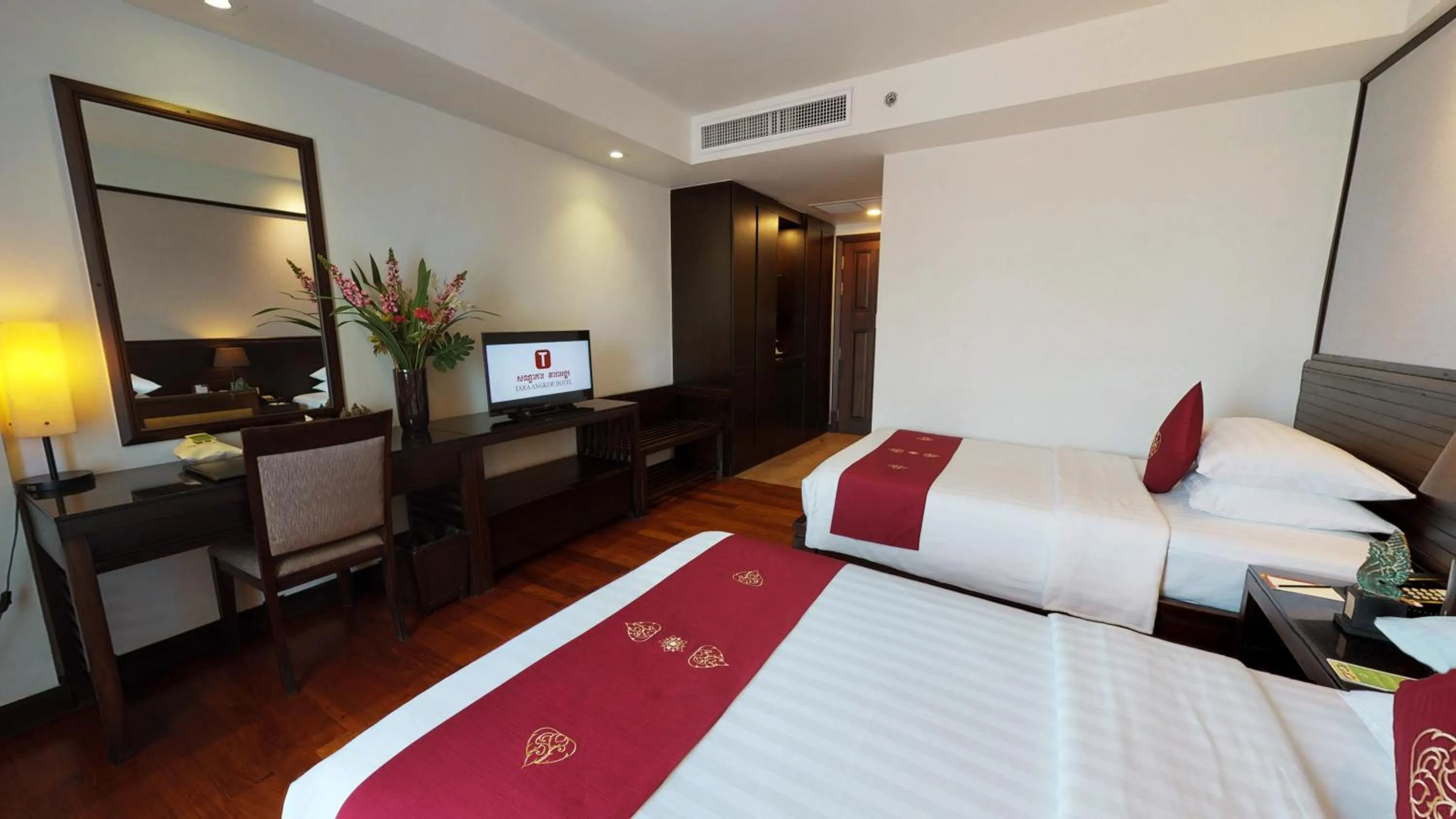 Bed in Tara Angkor Hotel