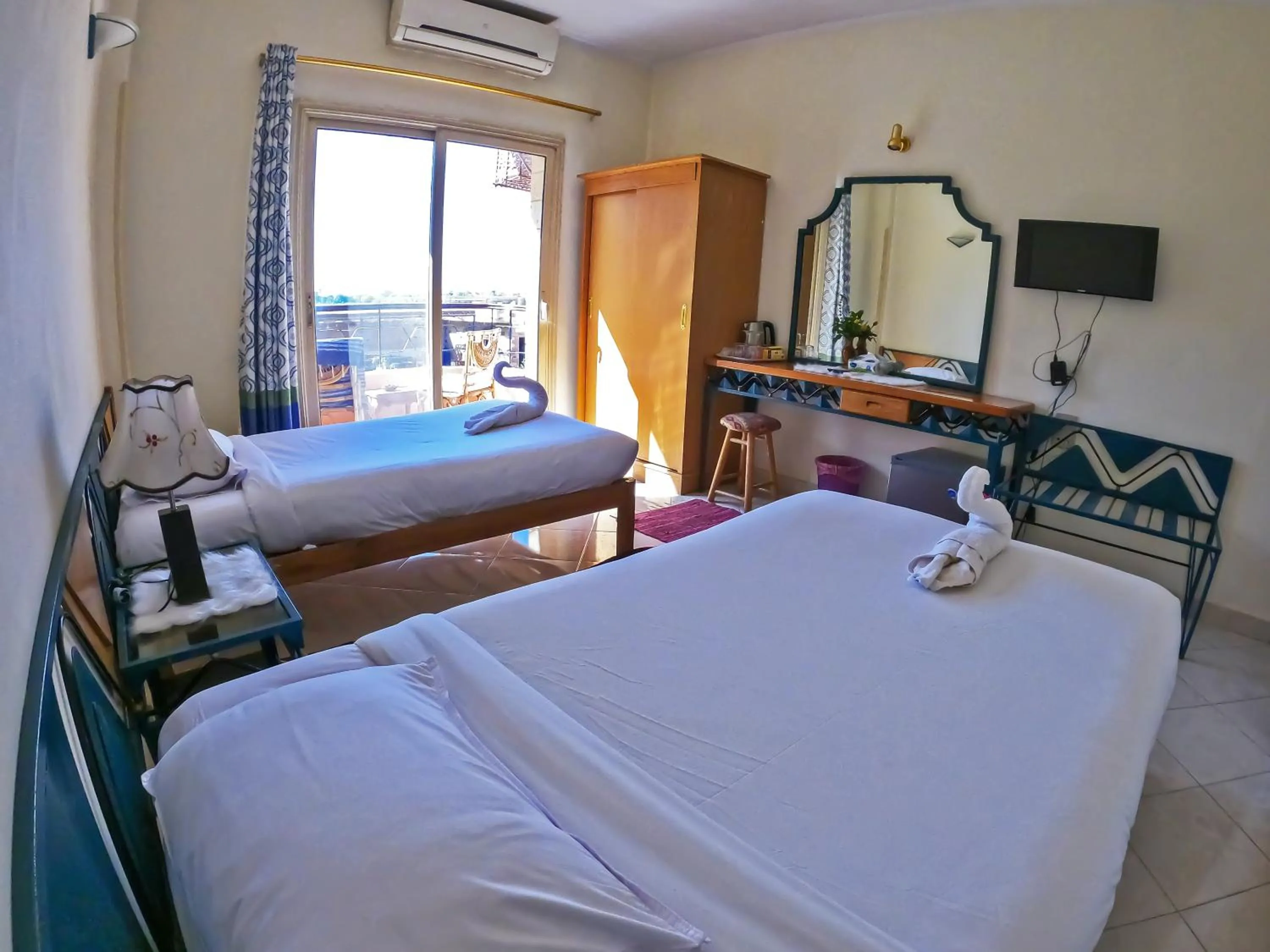 Bed in New Memnon Hotel