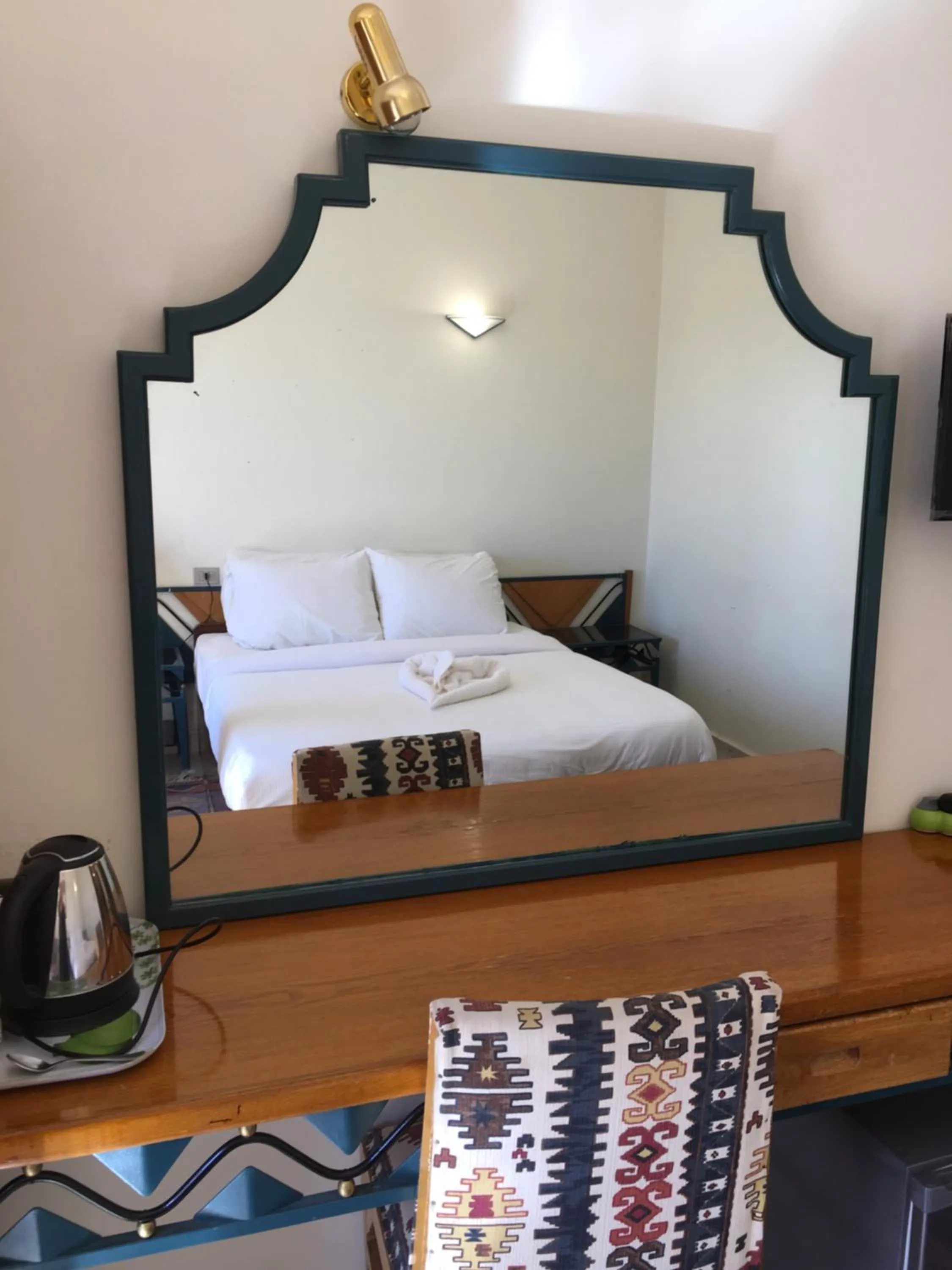 Bed in New Memnon Hotel