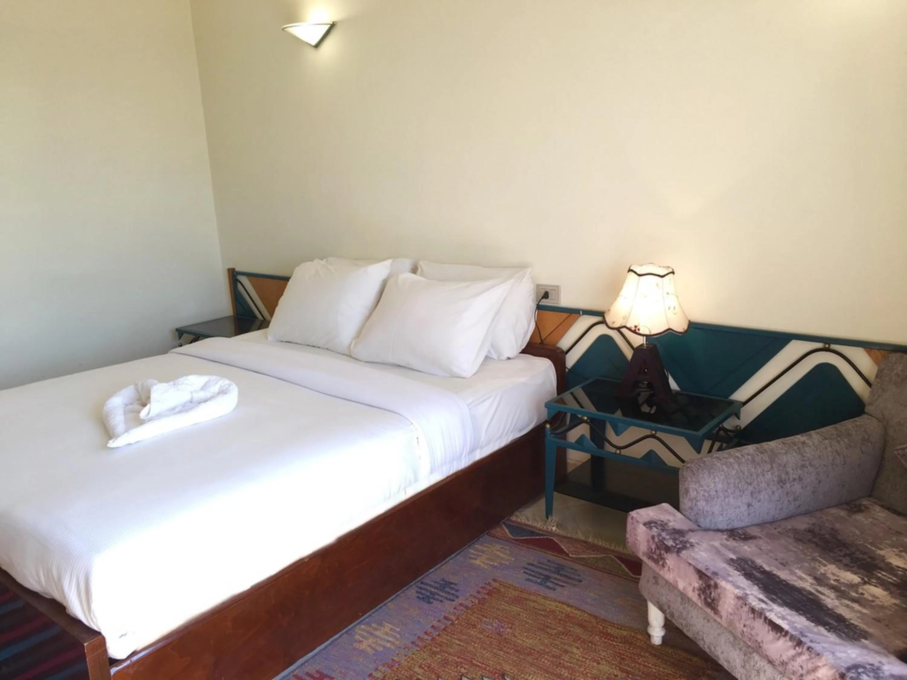 Bed in New Memnon Hotel