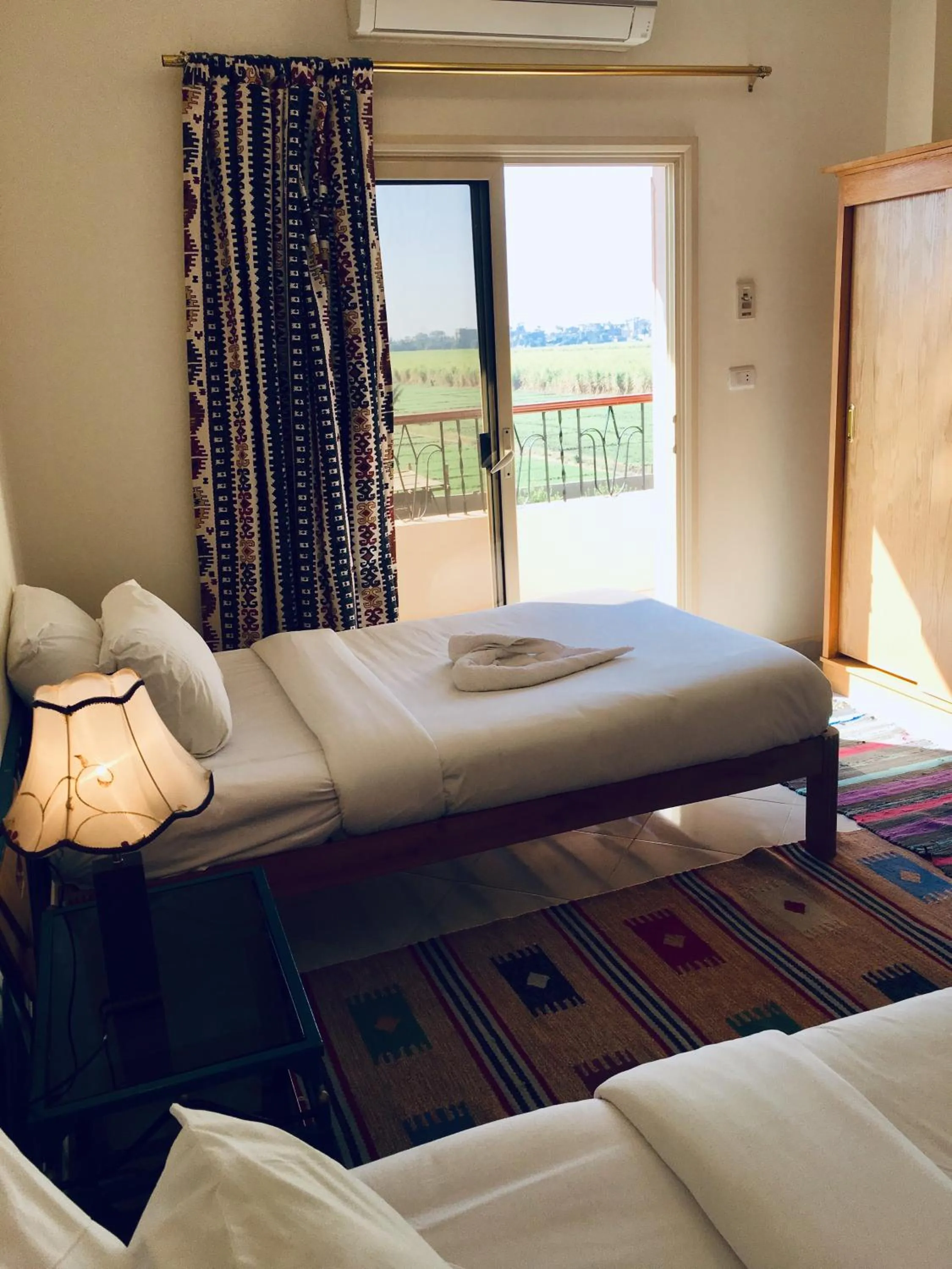 Bed in New Memnon Hotel