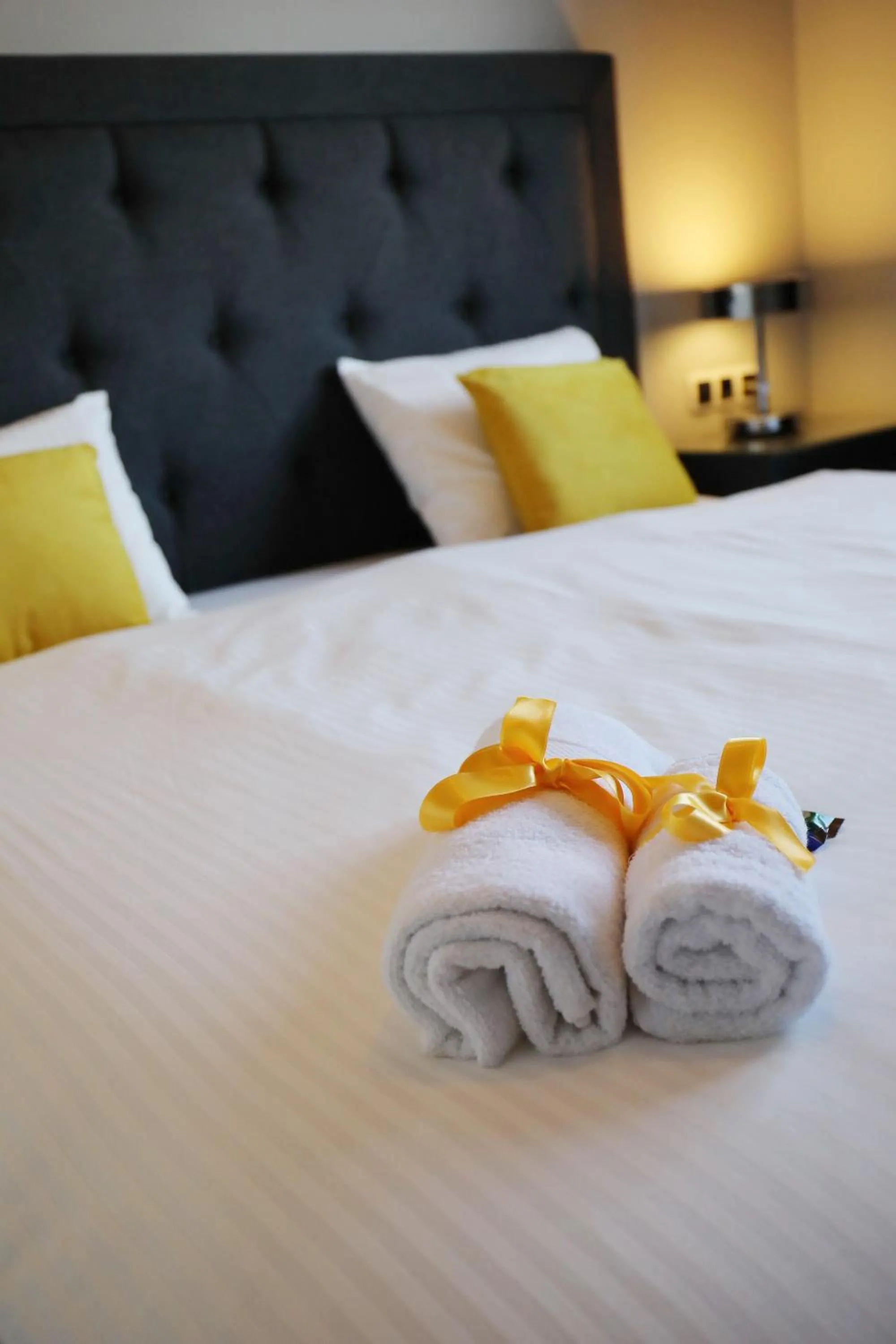 Bed in City Marine Luxury Apartments