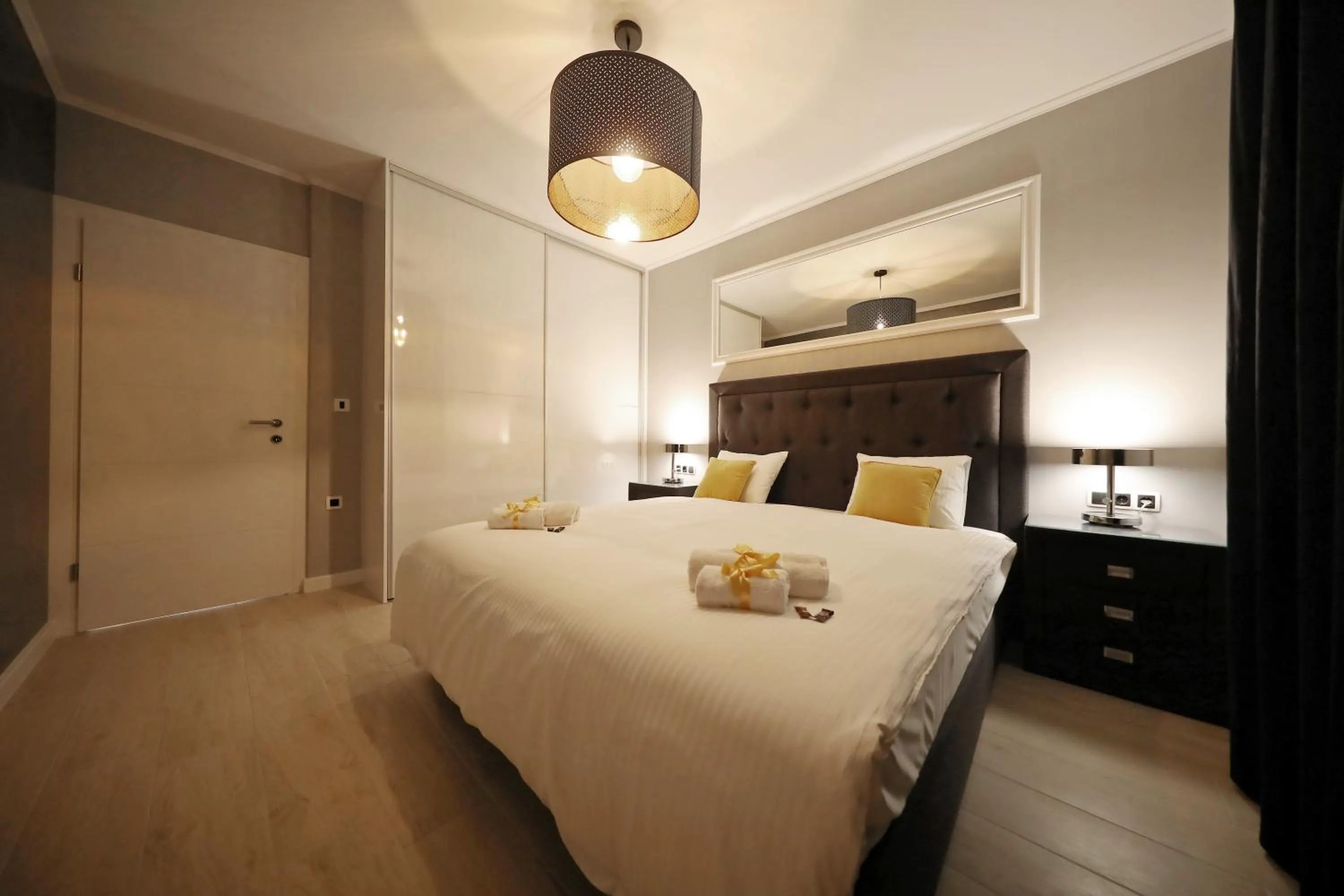 Bed in City Marine Luxury Apartments