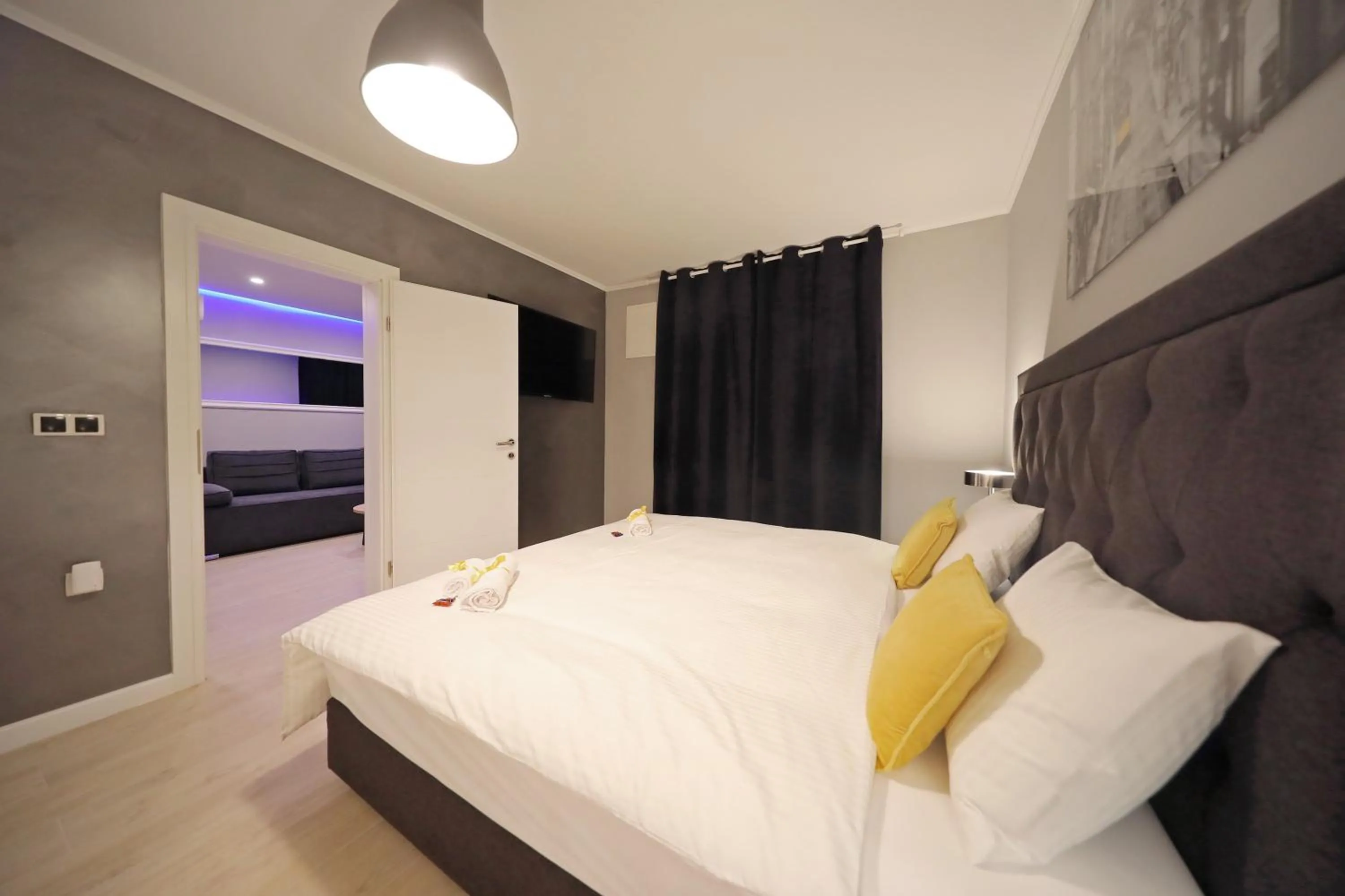 Bed in City Marine Luxury Apartments