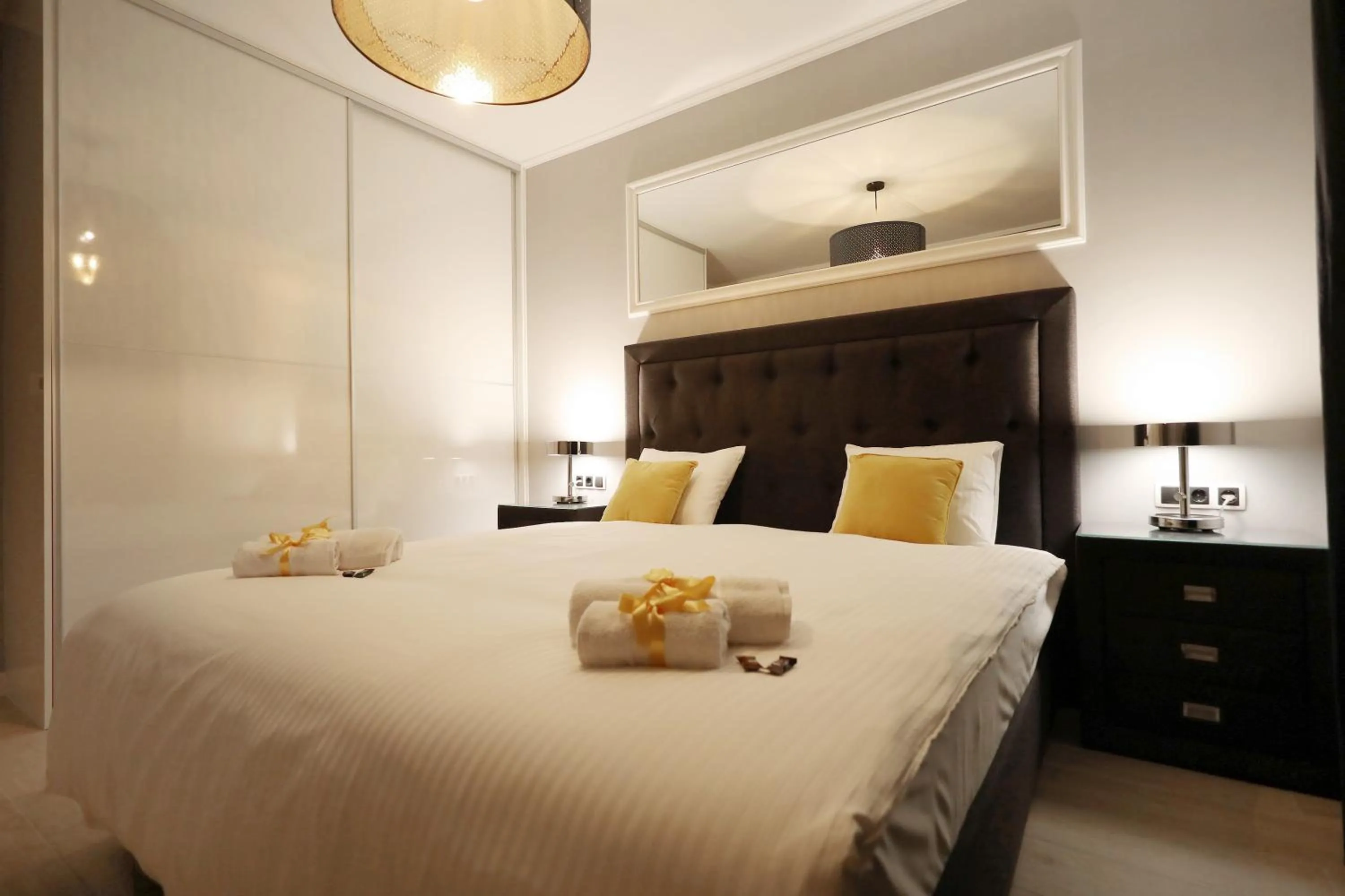 Bed in City Marine Luxury Apartments