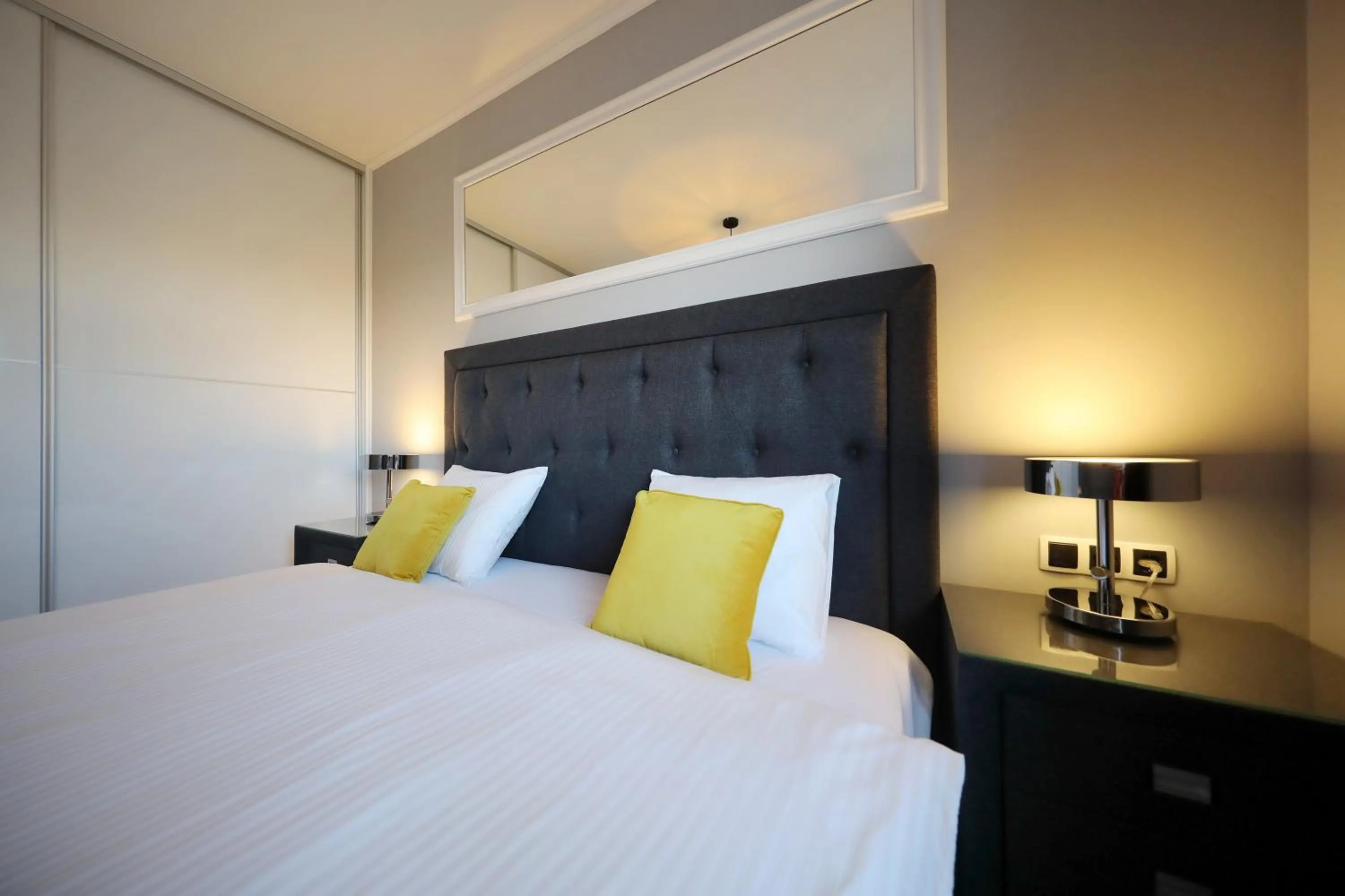 Bed in City Marine Luxury Apartments