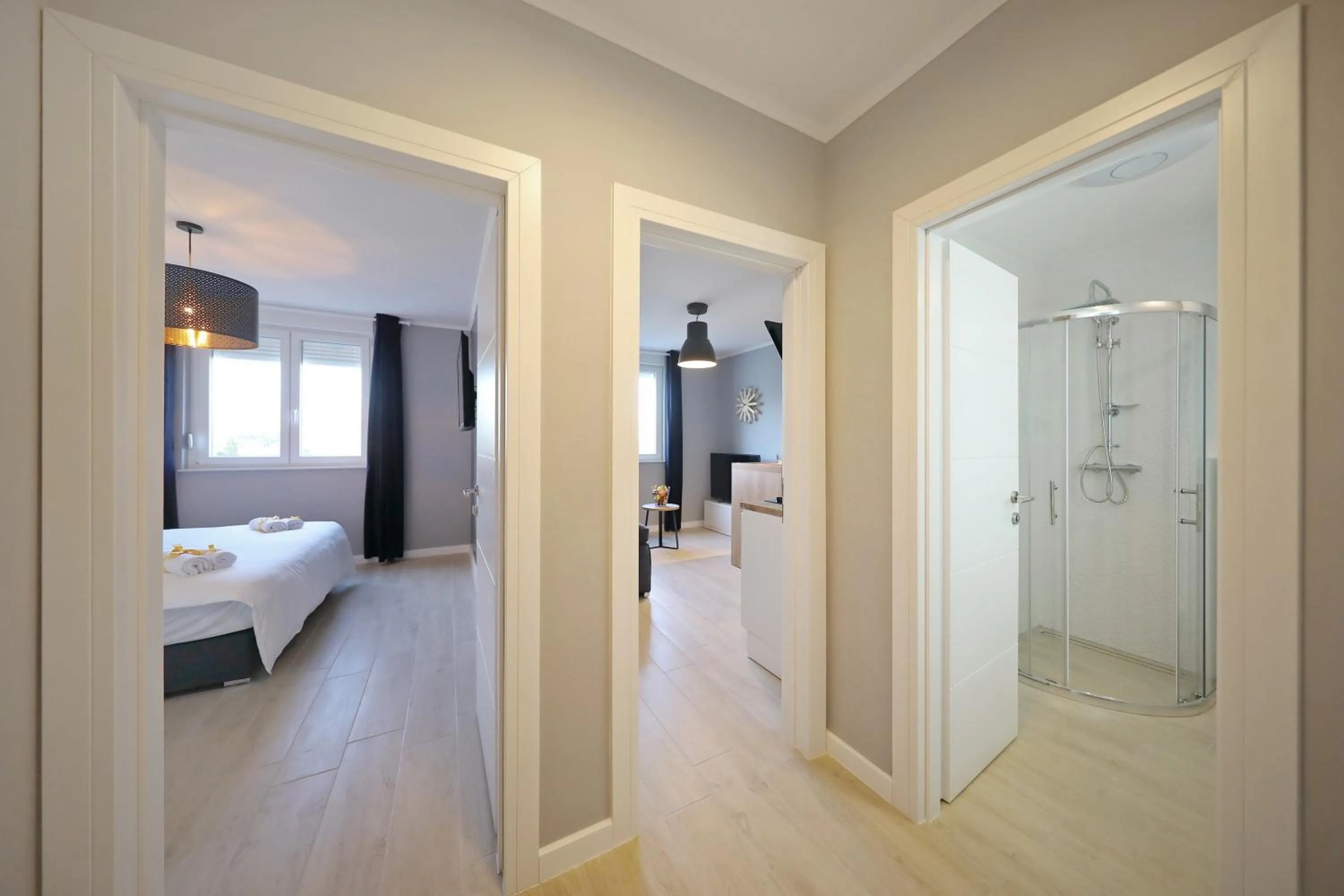 Bed in City Marine Luxury Apartments