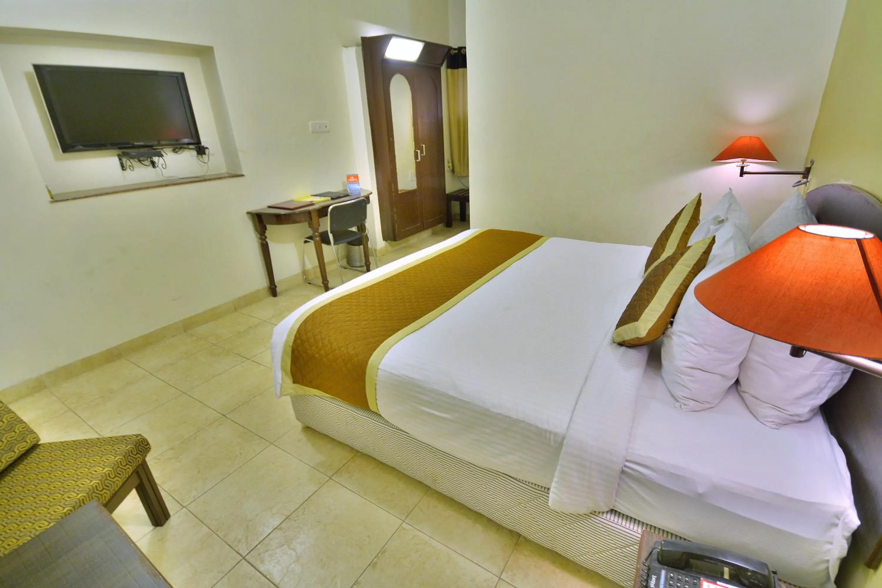 Photo of the whole room, Bed in Rajputana Palace