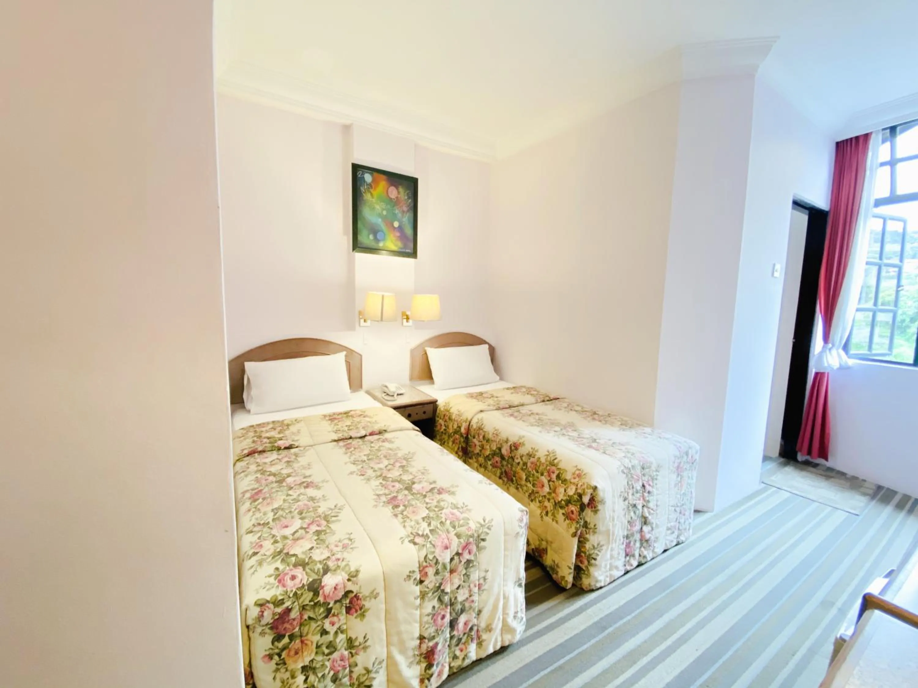 Bed in Hotel Rainbow