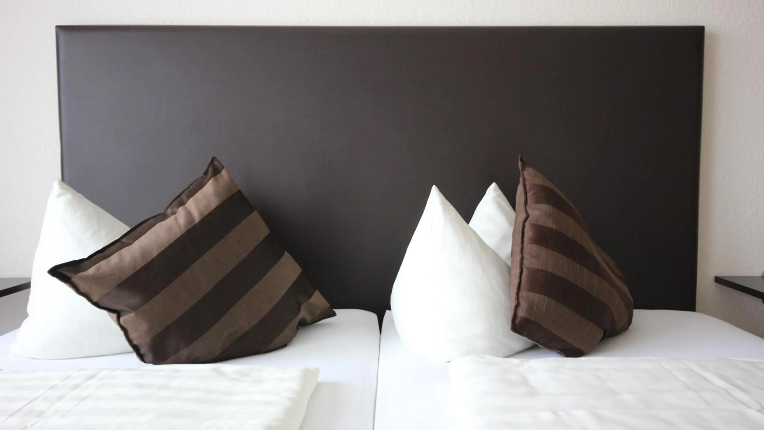 Bed in Kaiser´s Weinland Hotel