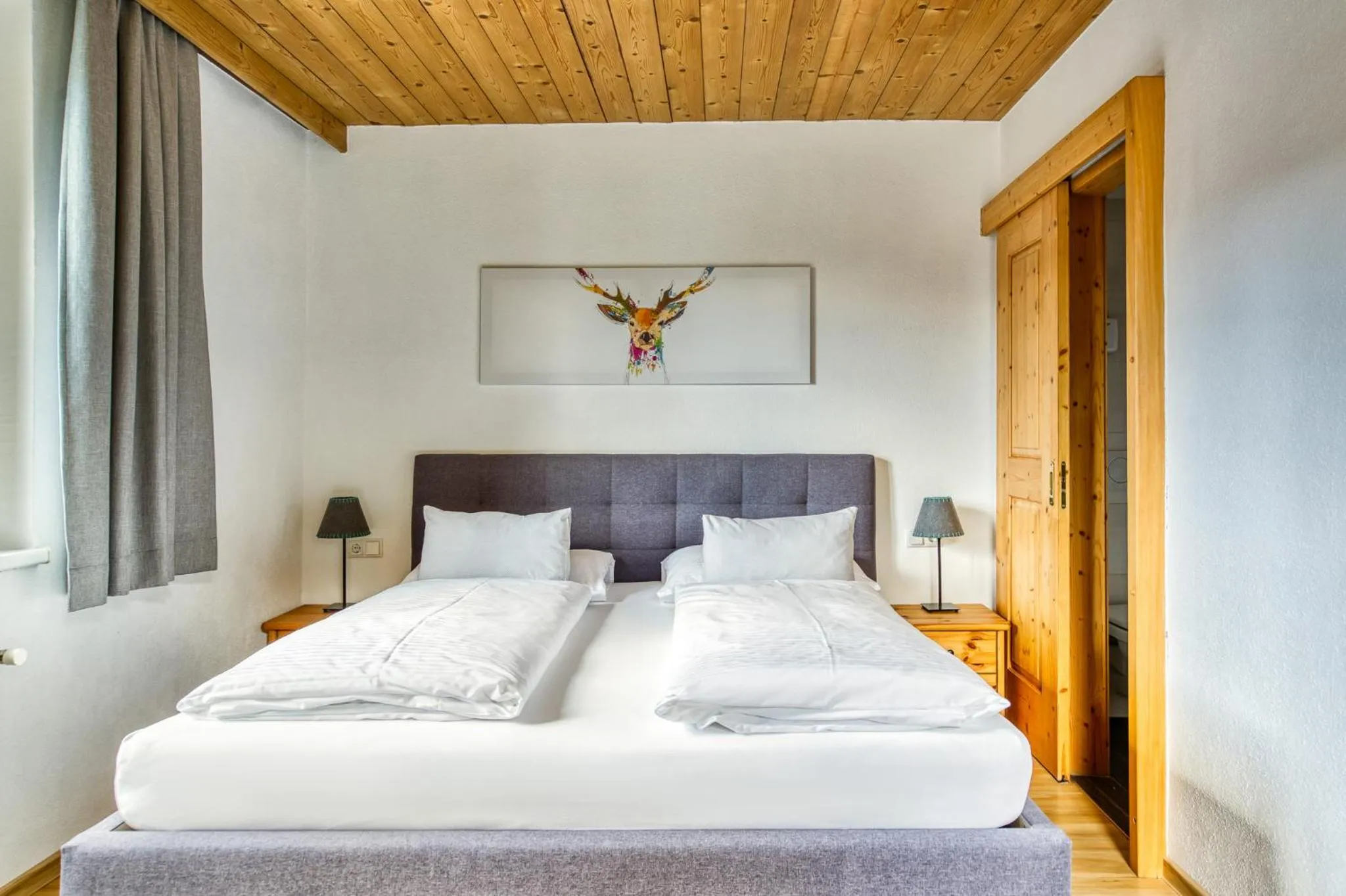 Photo of the whole room, Bed in Boutiquehotel ZOMM in Seefeld