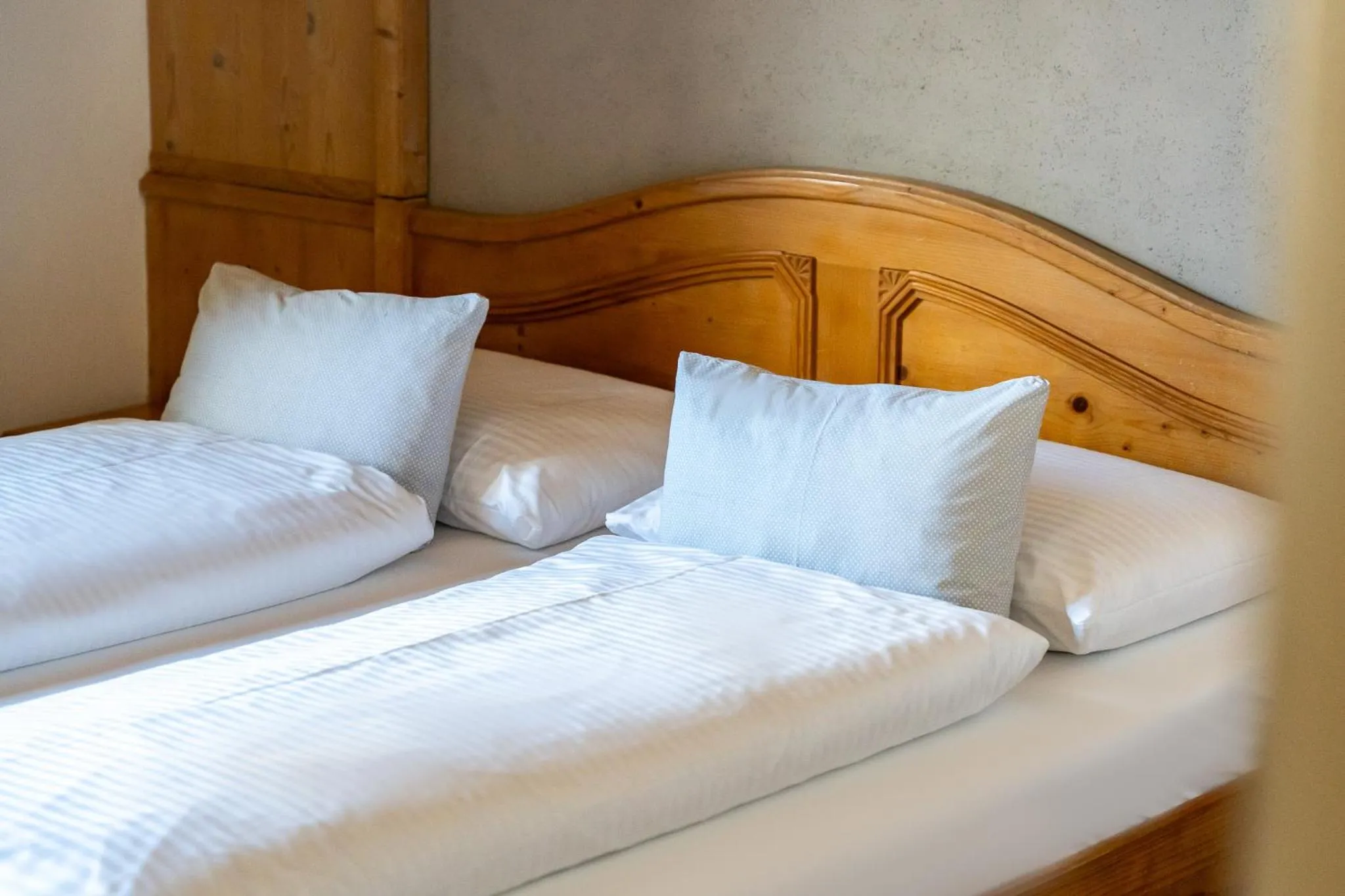 Photo of the whole room, Bed in Boutiquehotel ZOMM in Seefeld