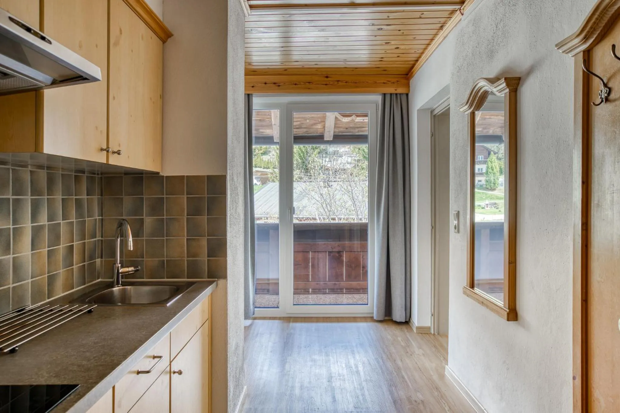 Kitchen or kitchenette in Boutiquehotel ZOMM in Seefeld