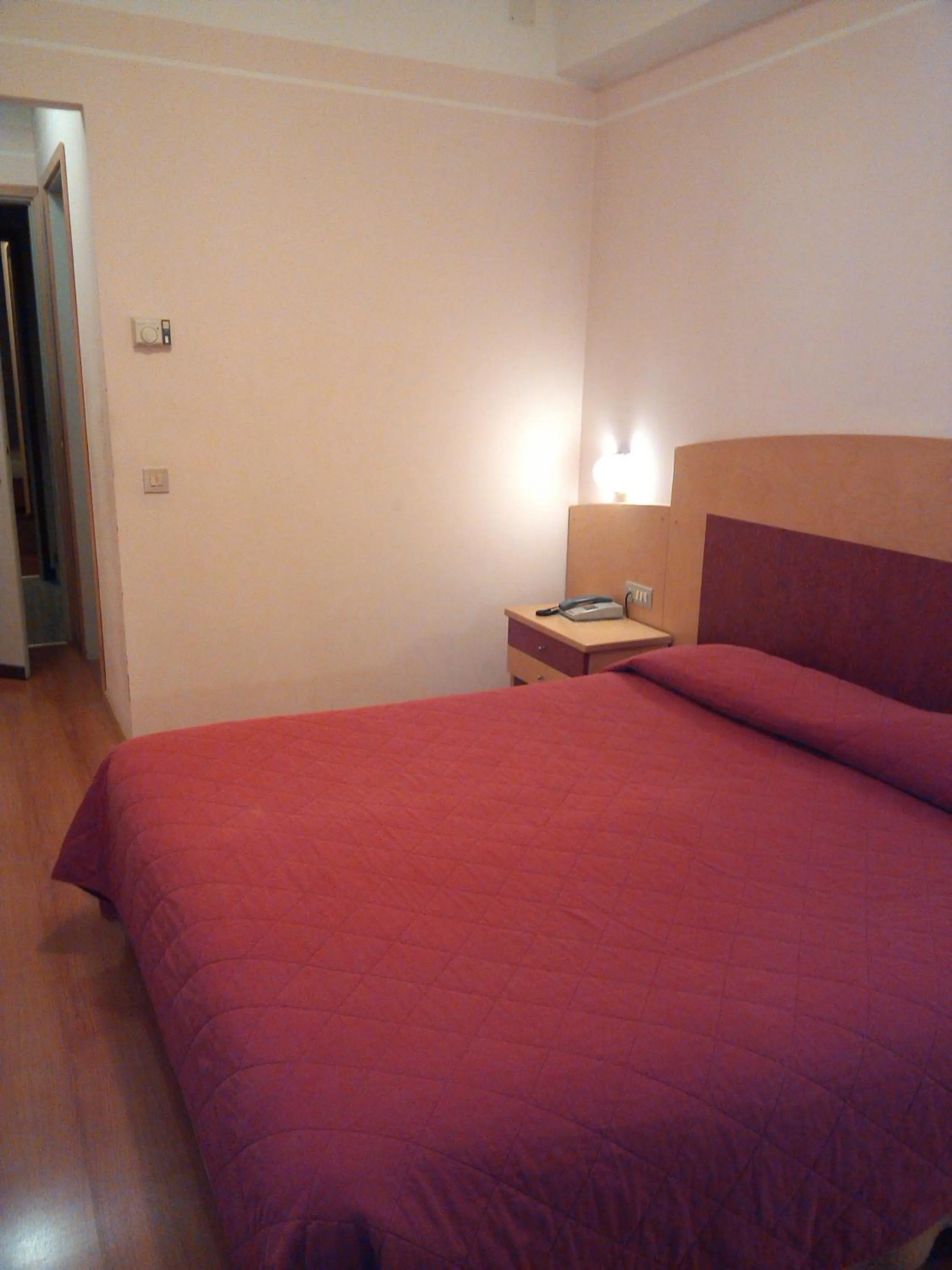 Bed in Hotel Palladio