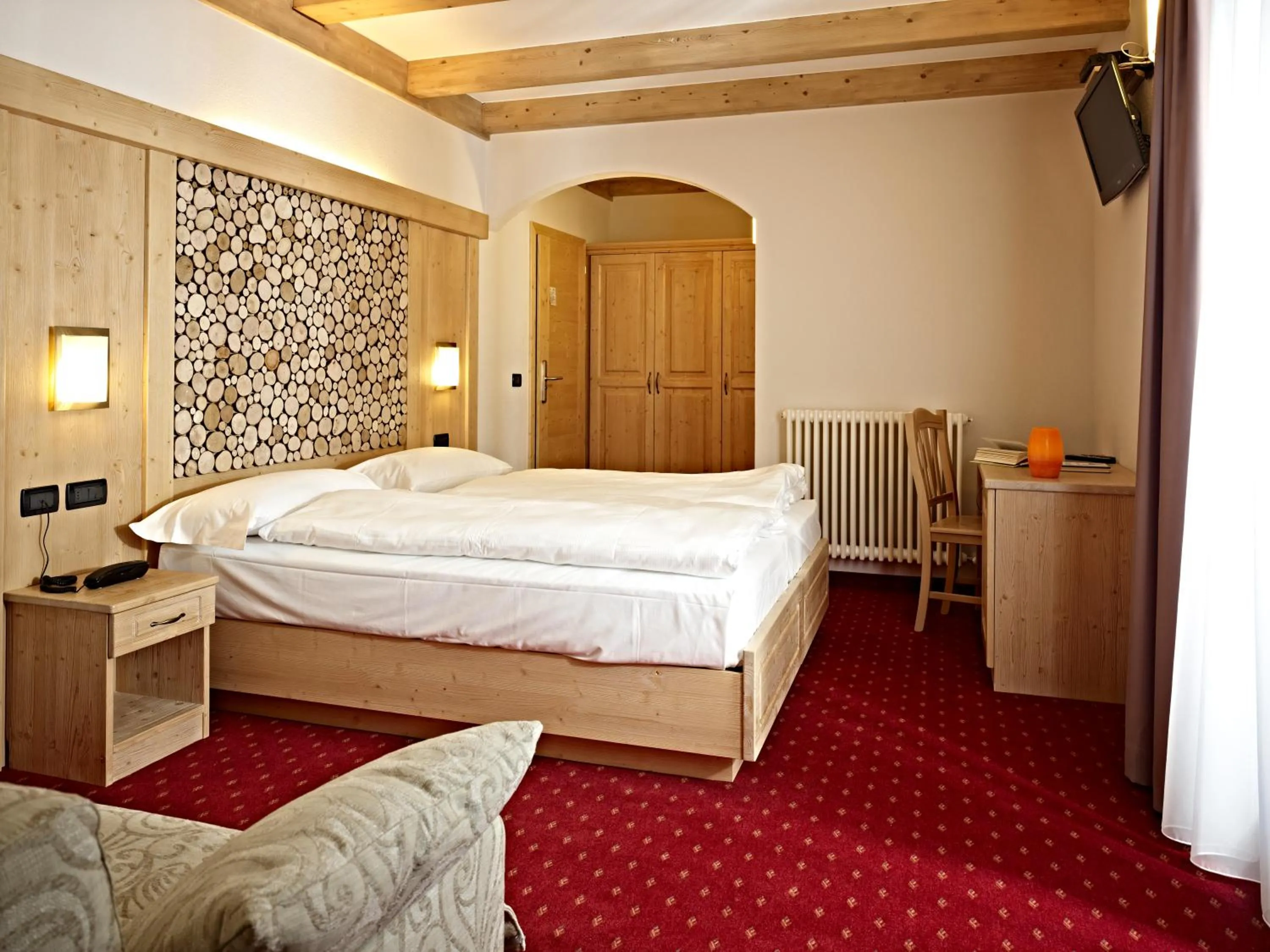 Bed in Hotel Garni My Ledro