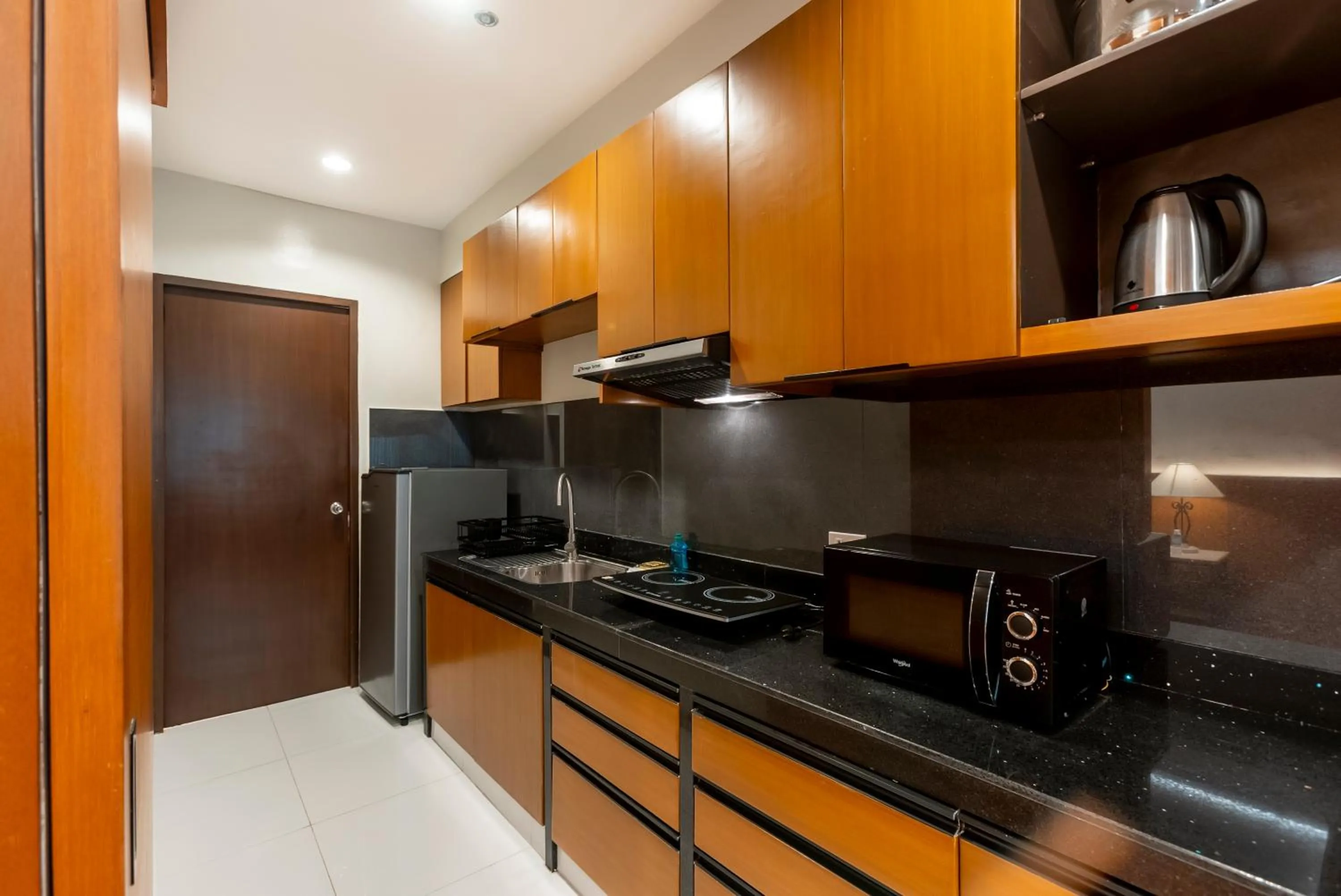 Kitchen or kitchenette in Tropicana Suites