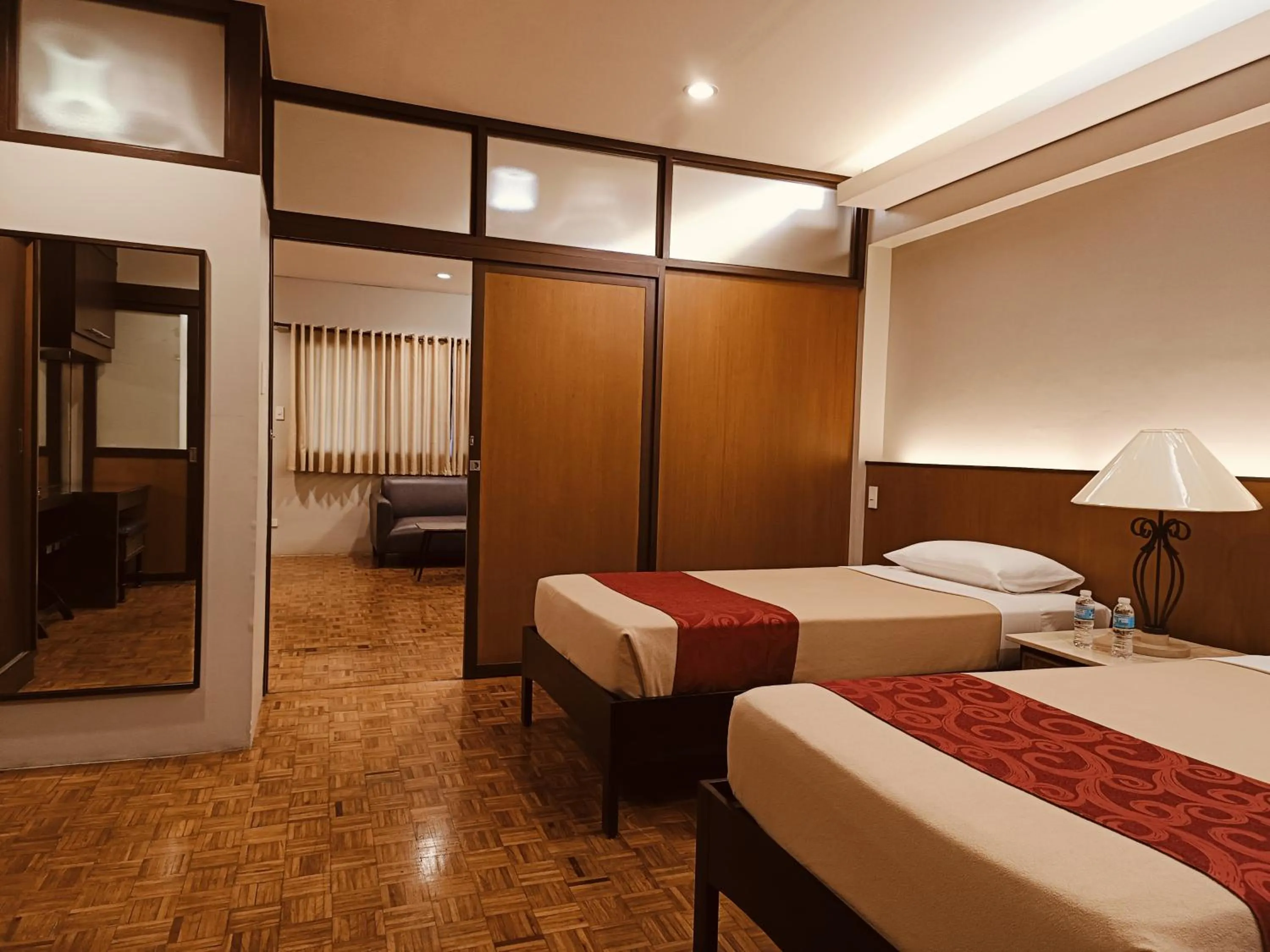 Bed in Tropicana Suites