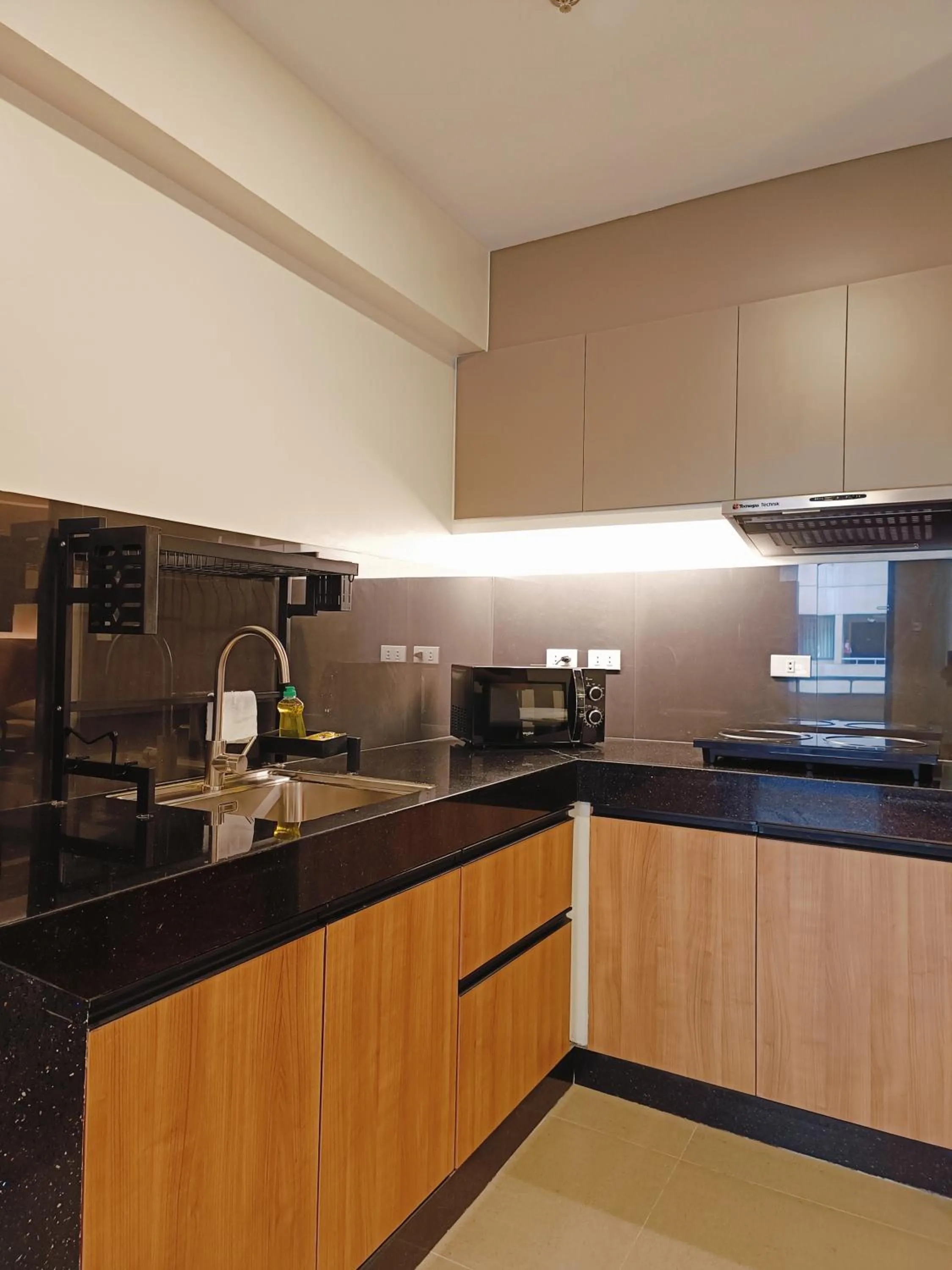 Kitchen or kitchenette in Tropicana Suites