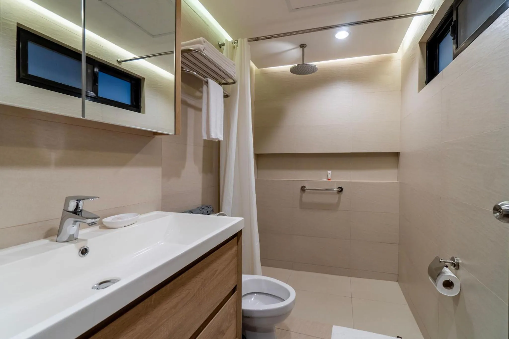 Toilet in Tropicana Suites