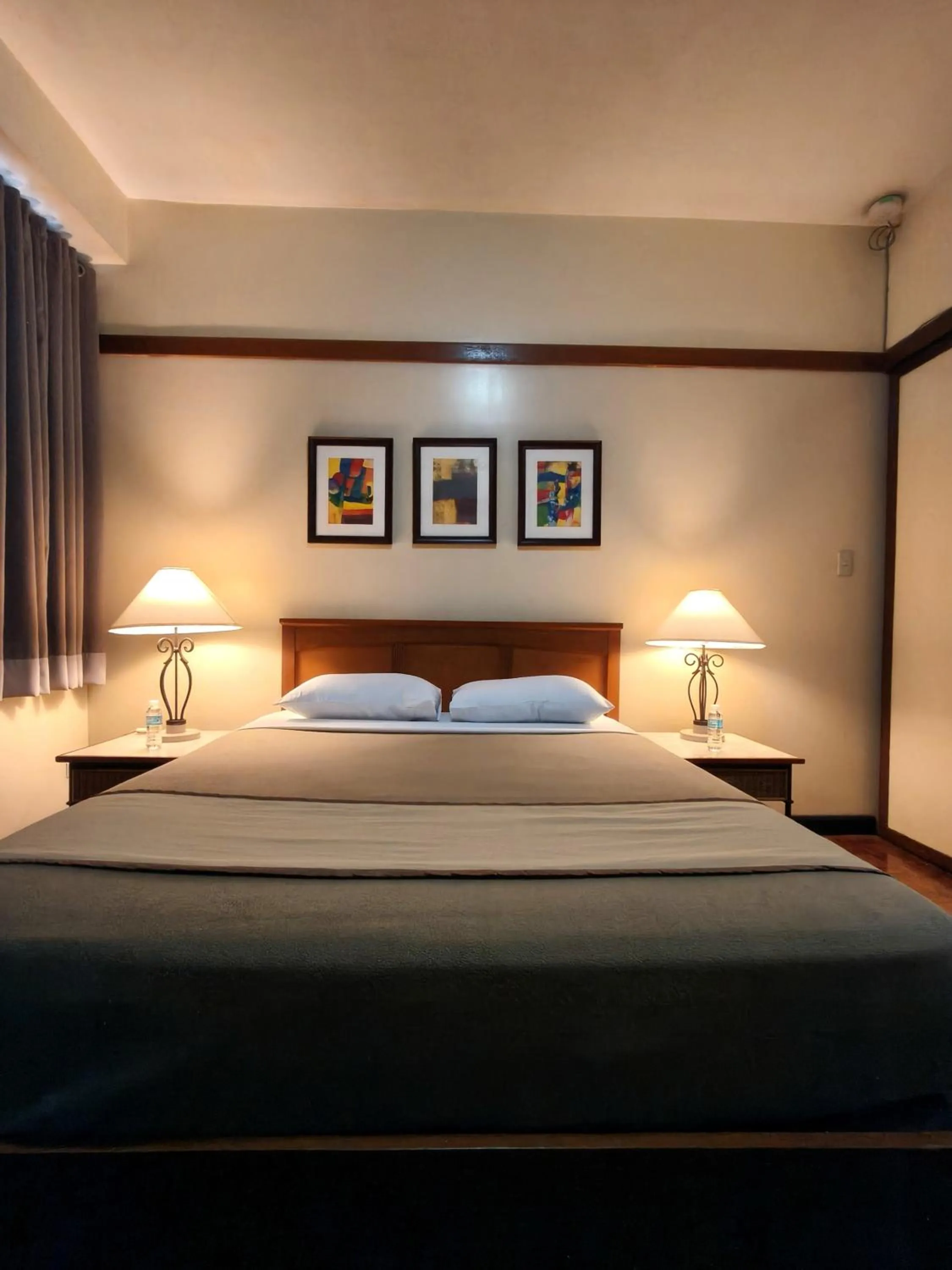 Bed in Tropicana Suites