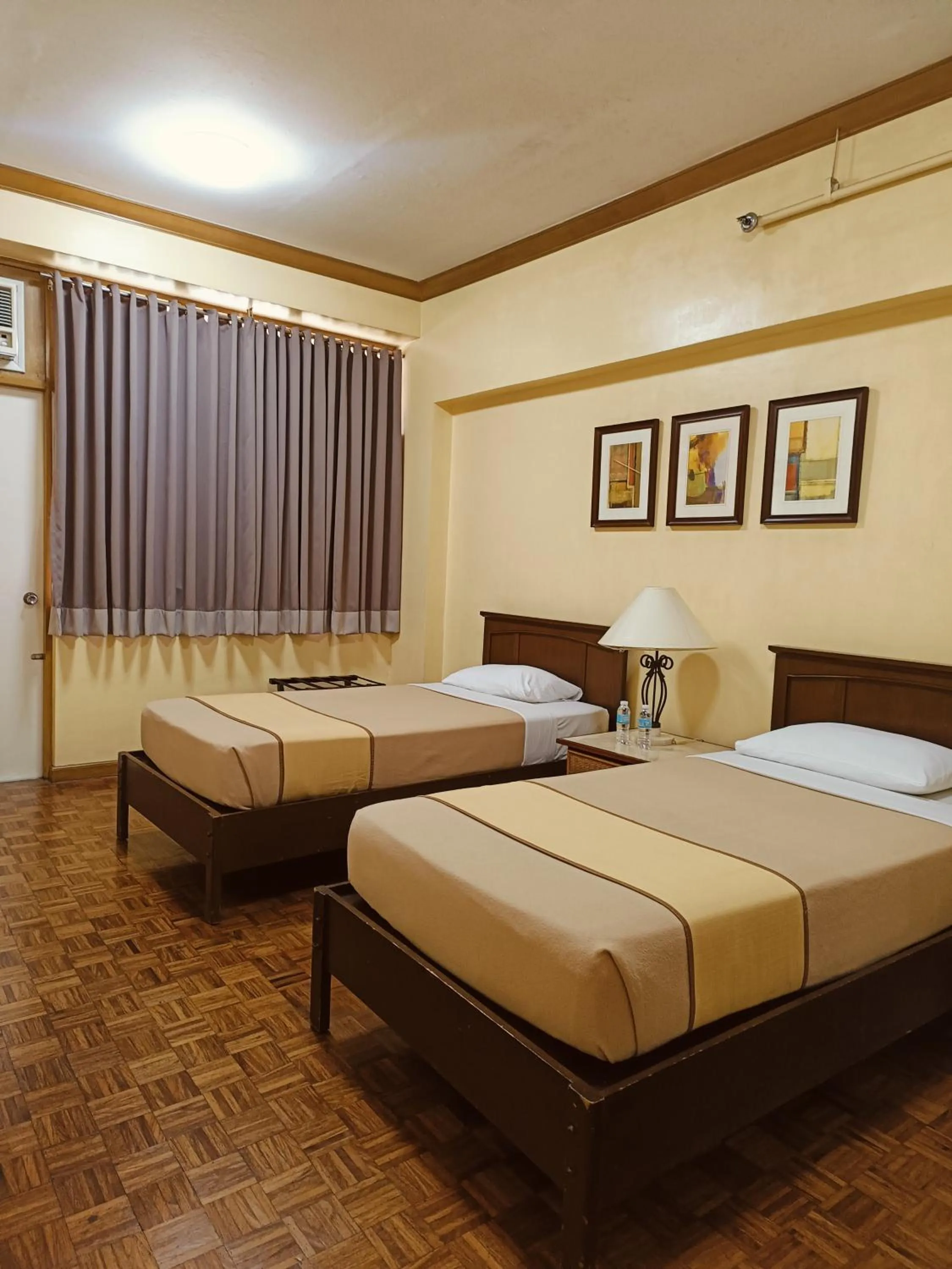 Bed in Tropicana Suites