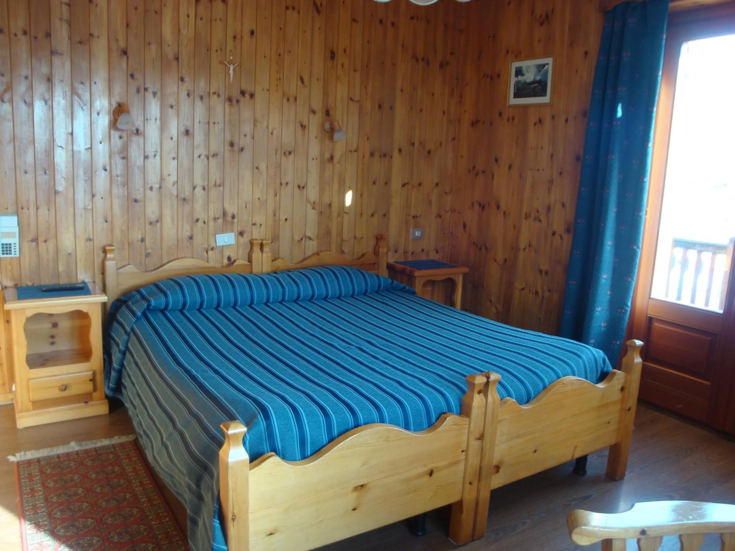 Bed in Hotel Alpe Fleurie