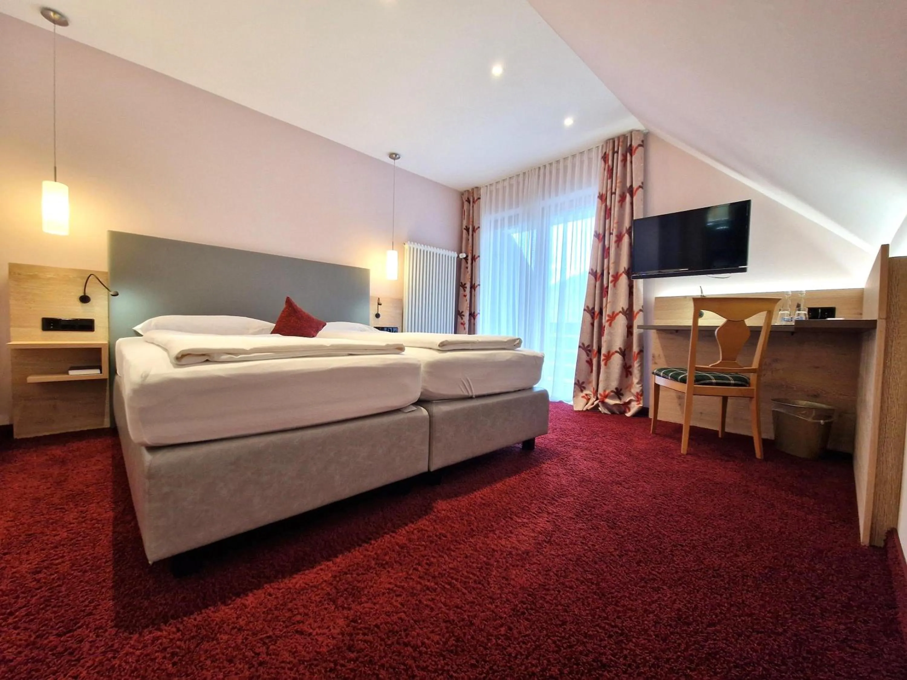 Bed in Mosers Blume Relax & Genuss Hotel