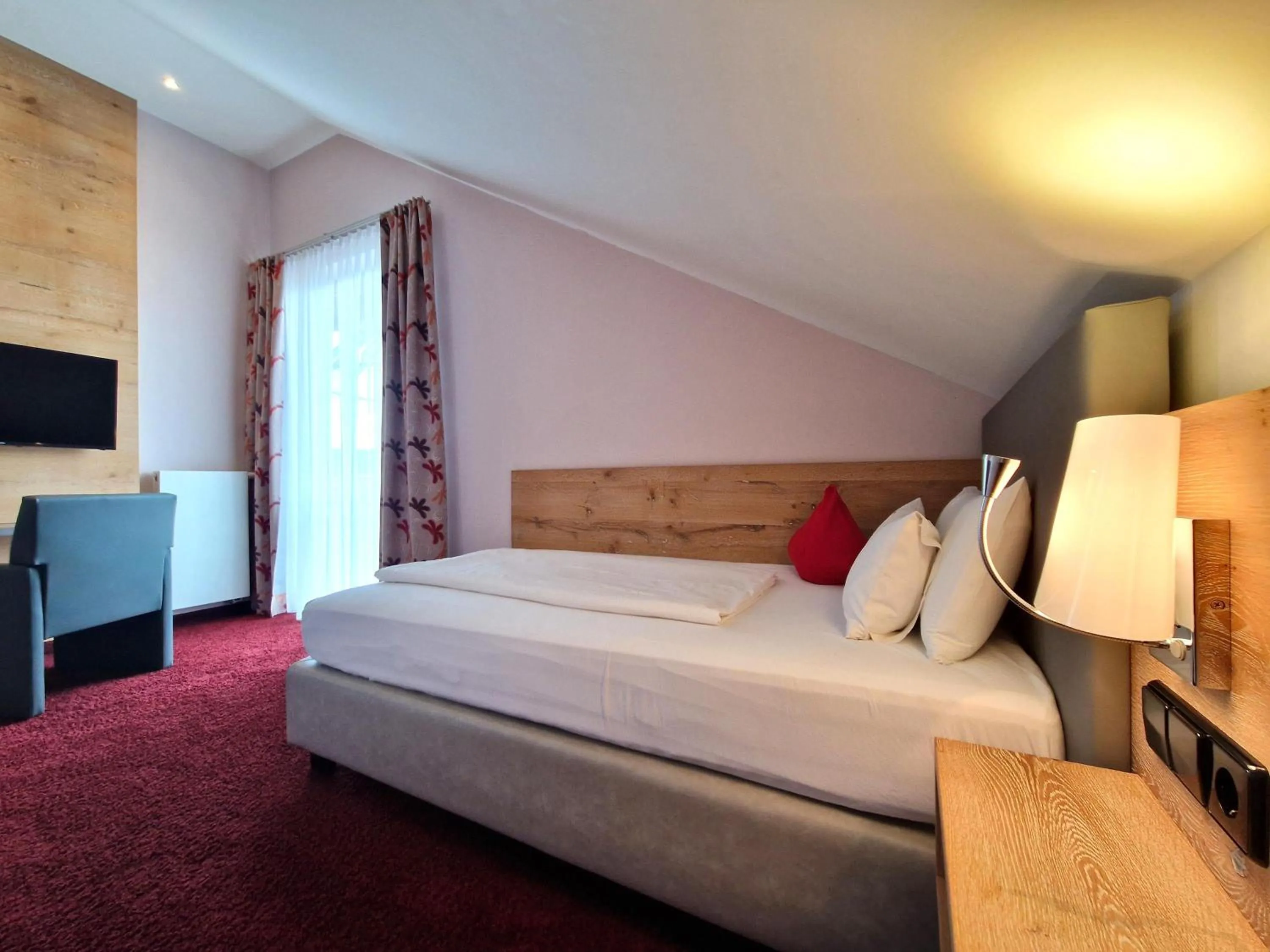 Bed in Mosers Blume Relax & Genuss Hotel