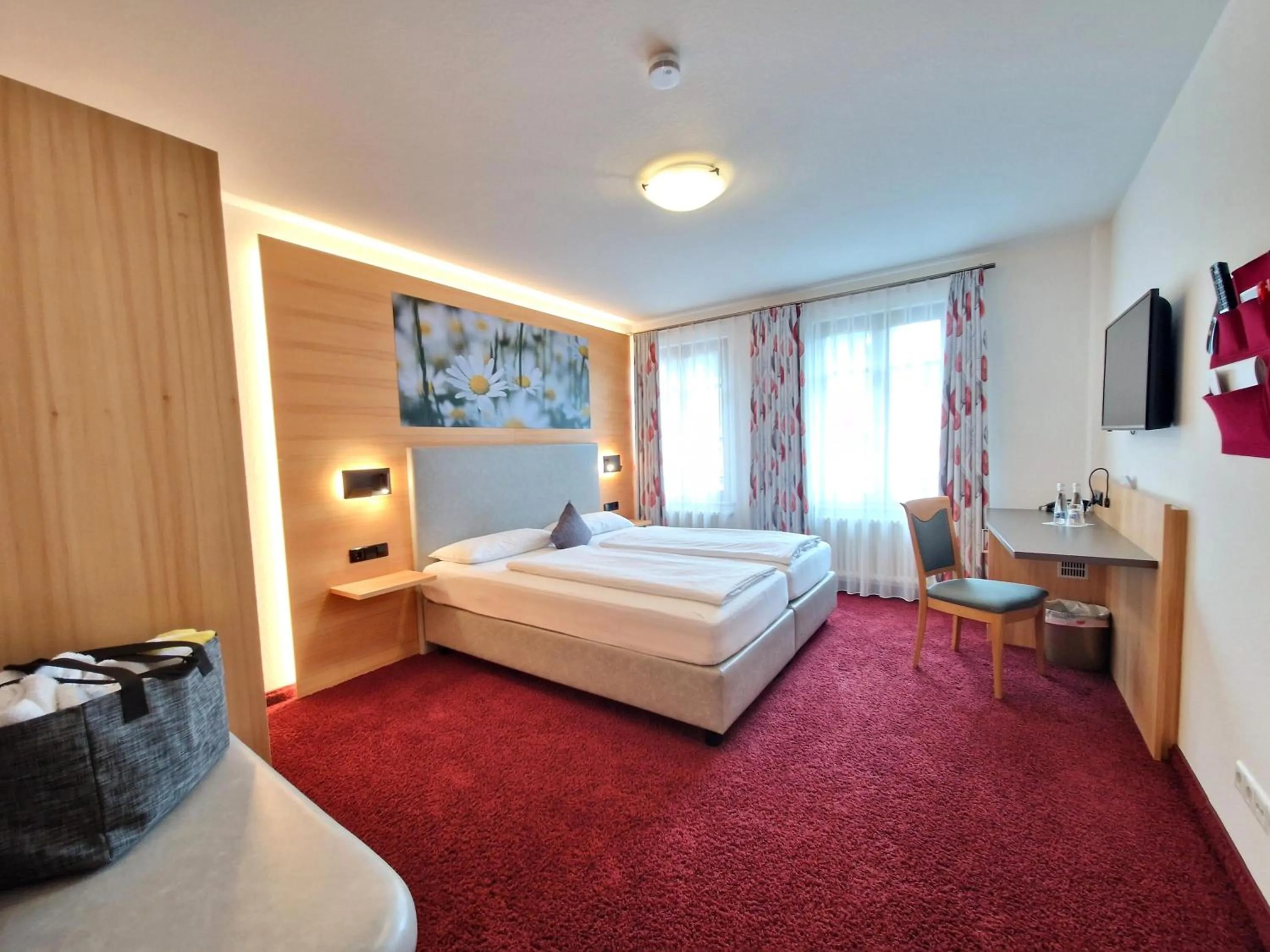 Bed in Mosers Blume Relax & Genuss Hotel