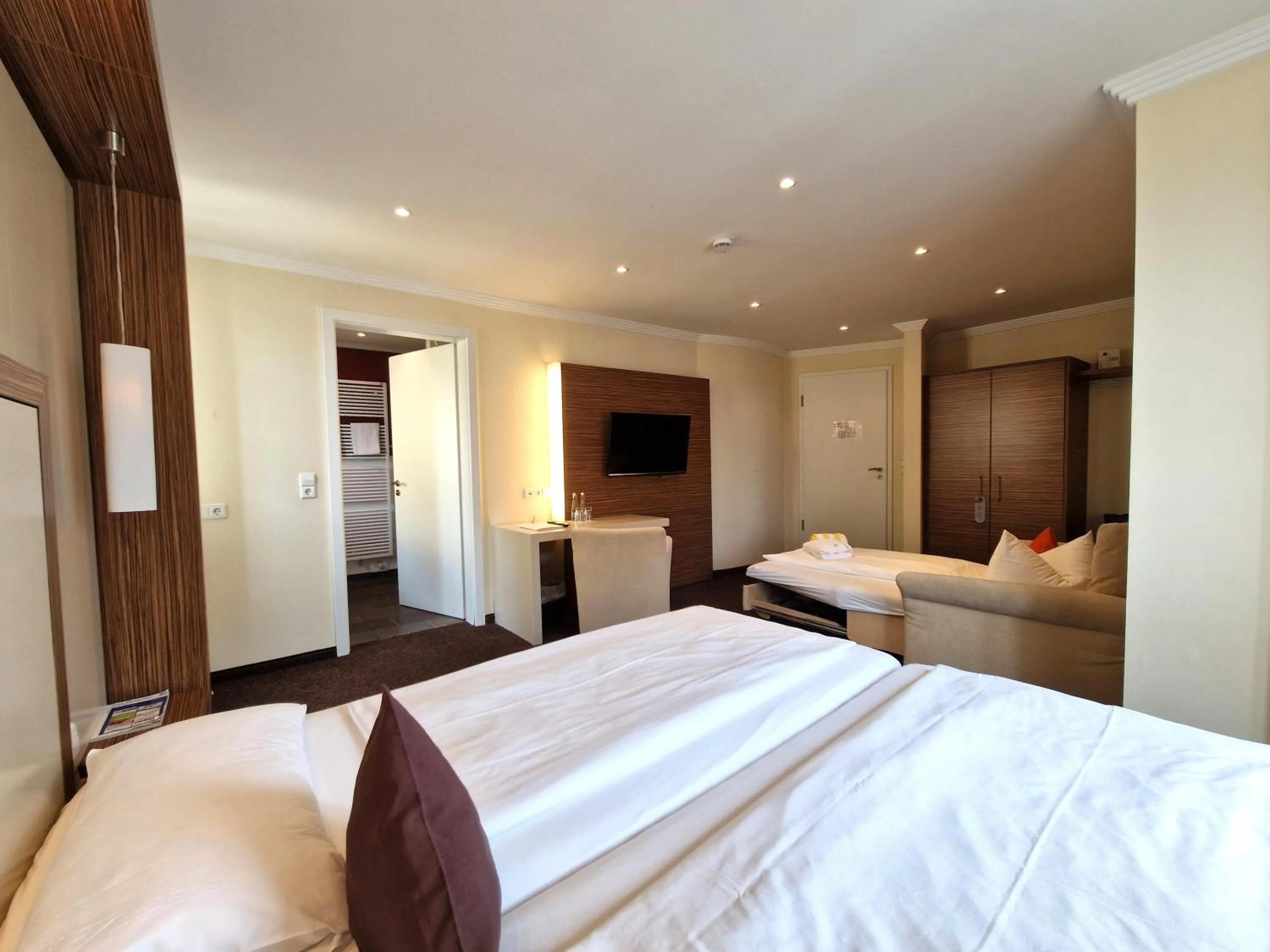 Bed in Mosers Blume Relax & Genuss Hotel