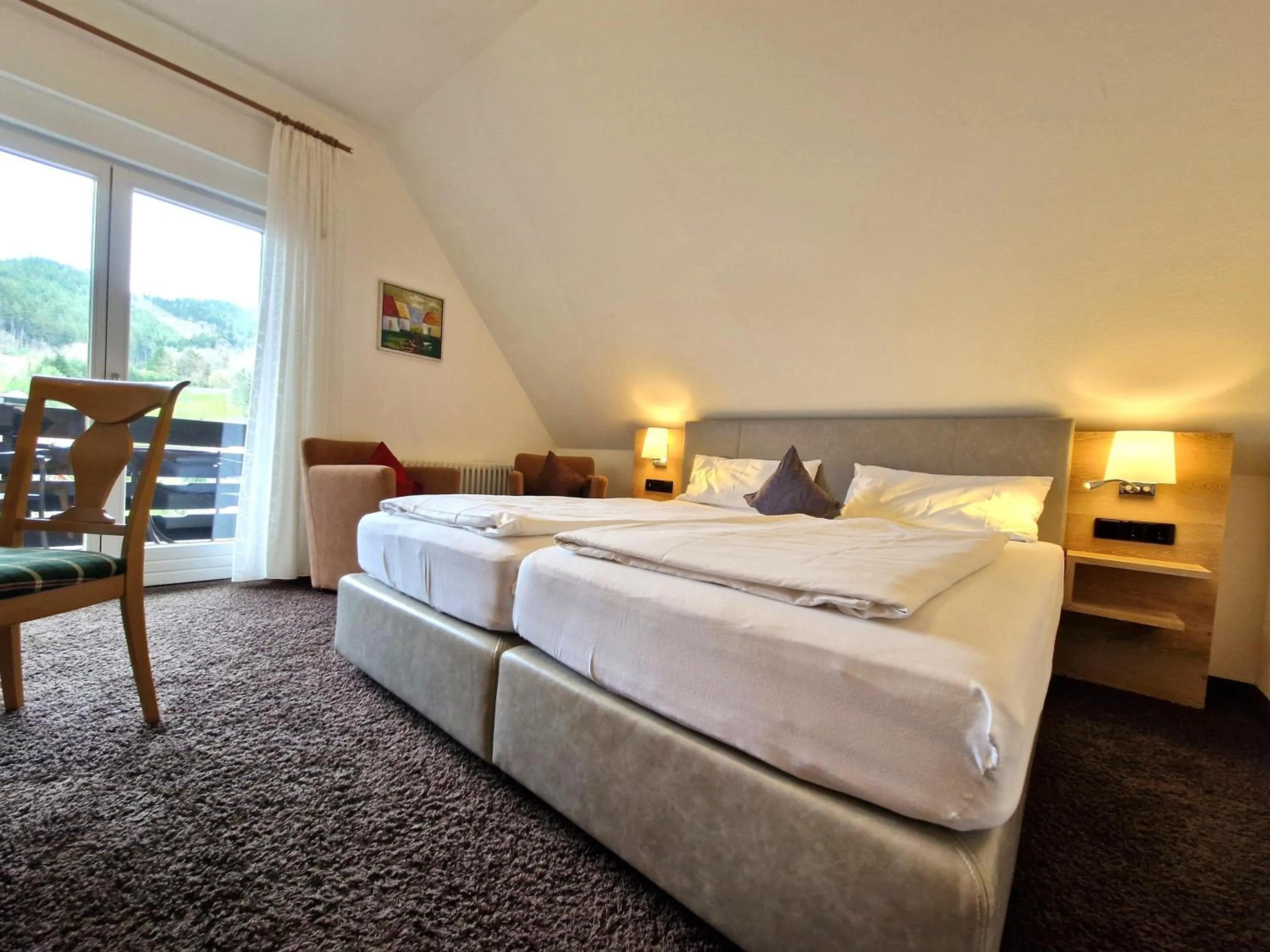 Bed in Mosers Blume Relax & Genuss Hotel