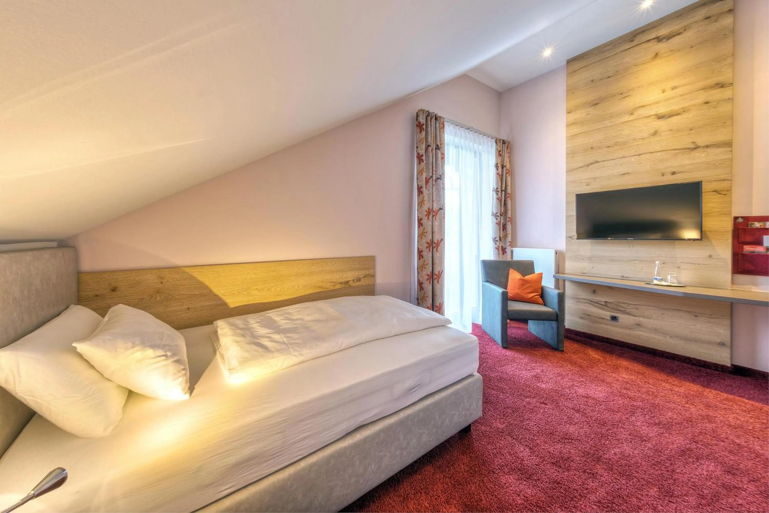 Bed in Mosers Blume Relax & Genuss Hotel