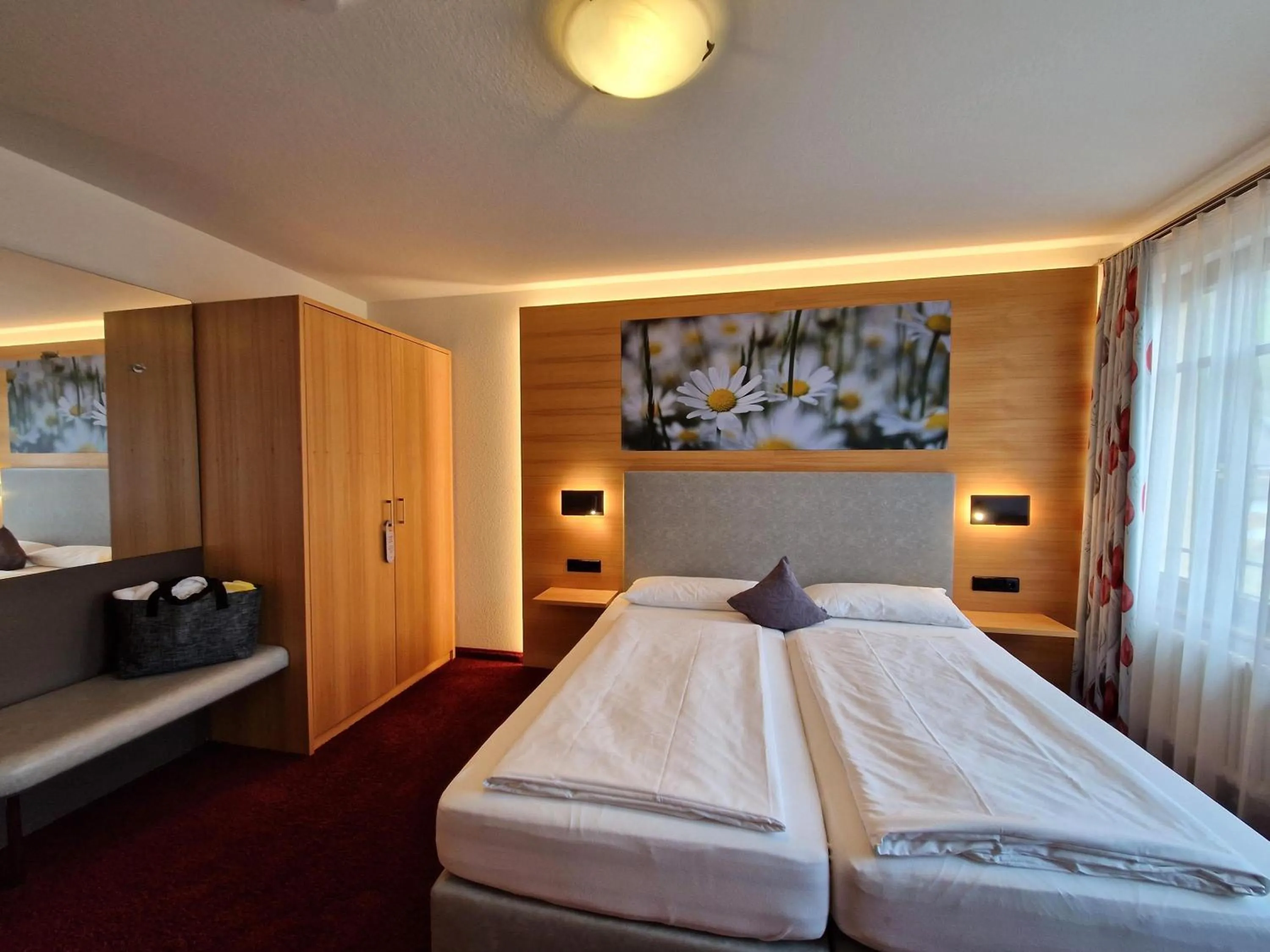 Bed in Mosers Blume Relax & Genuss Hotel