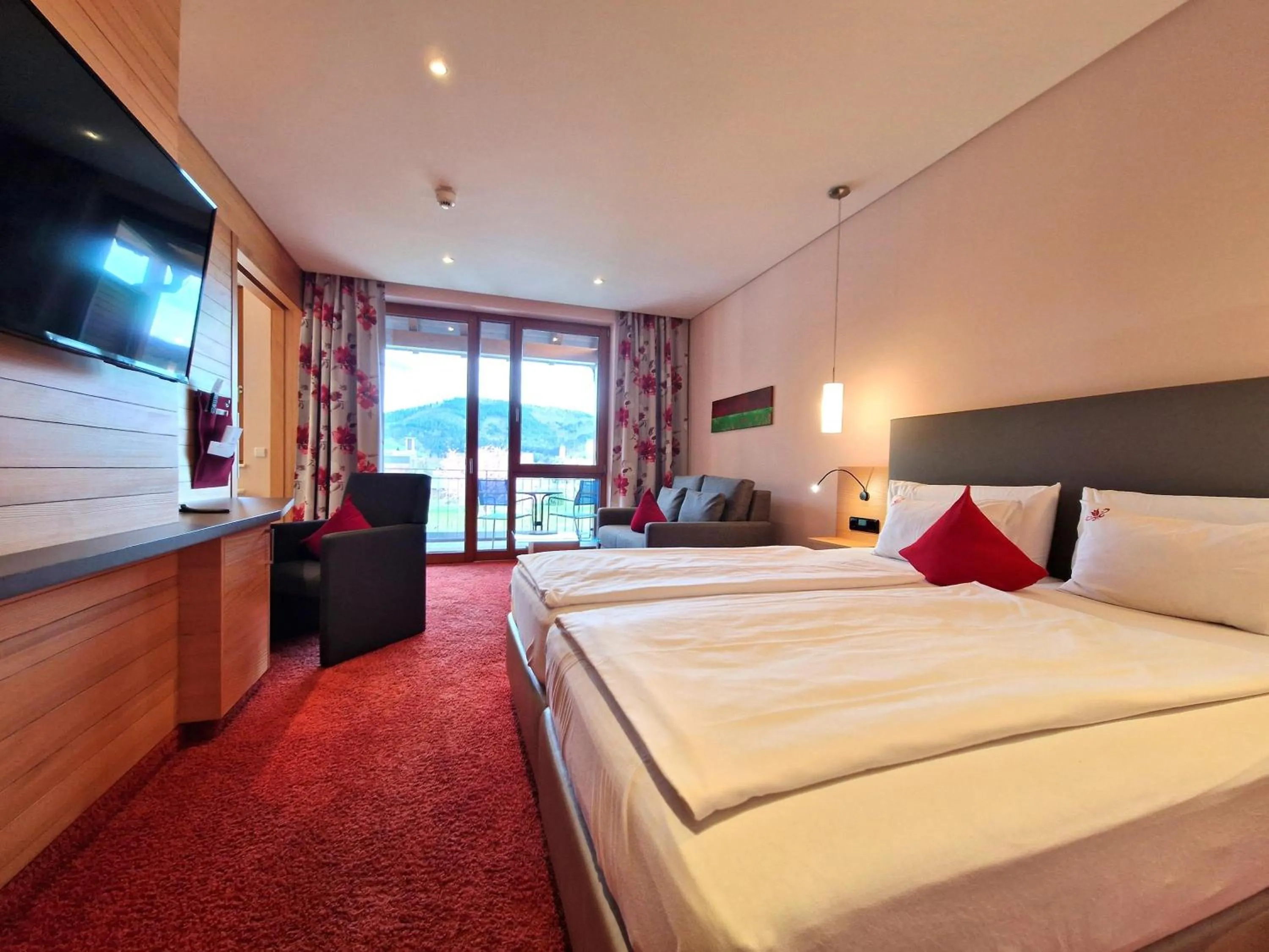 Bed in Mosers Blume Relax & Genuss Hotel