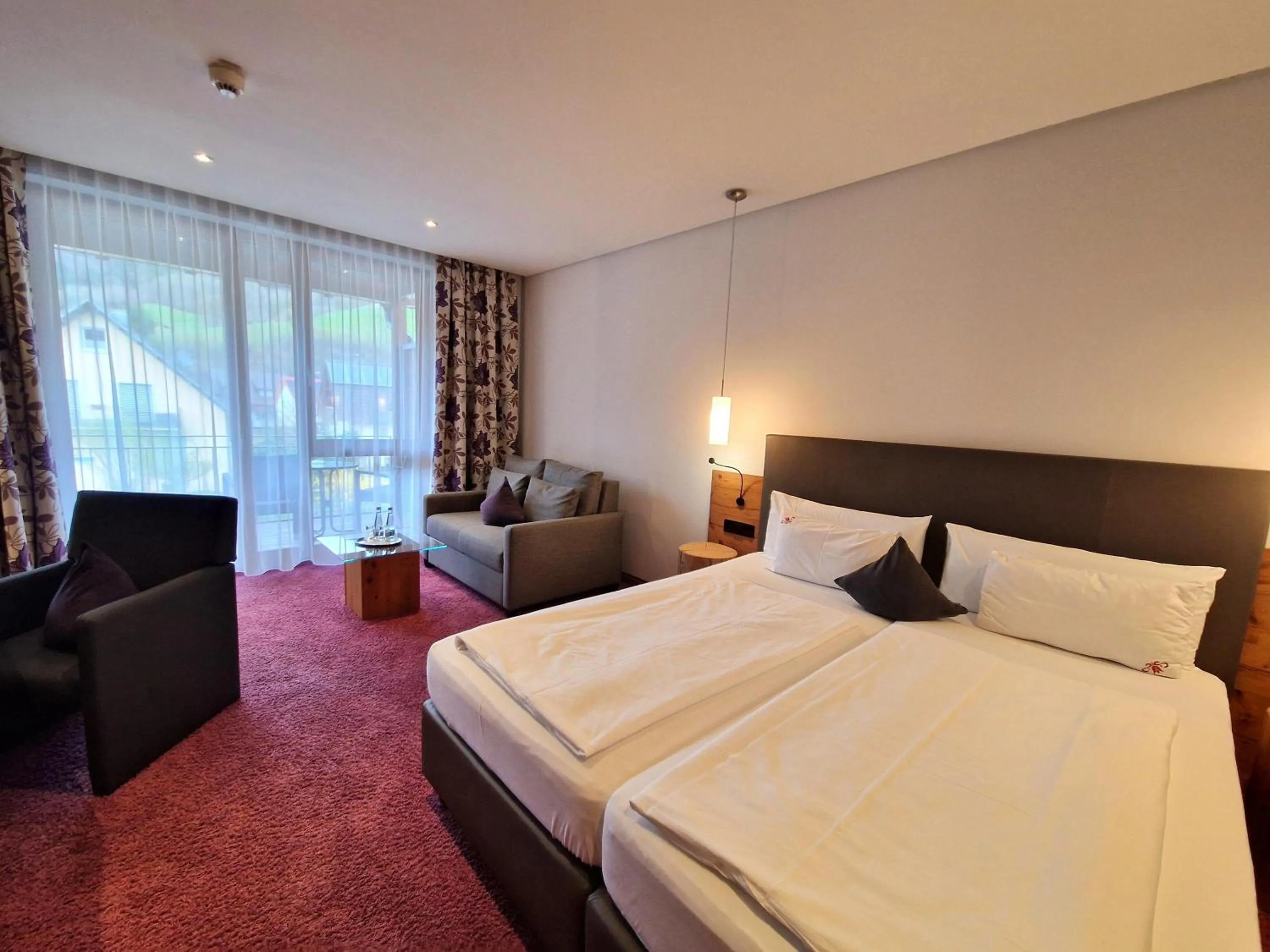 Bed in Mosers Blume Relax & Genuss Hotel