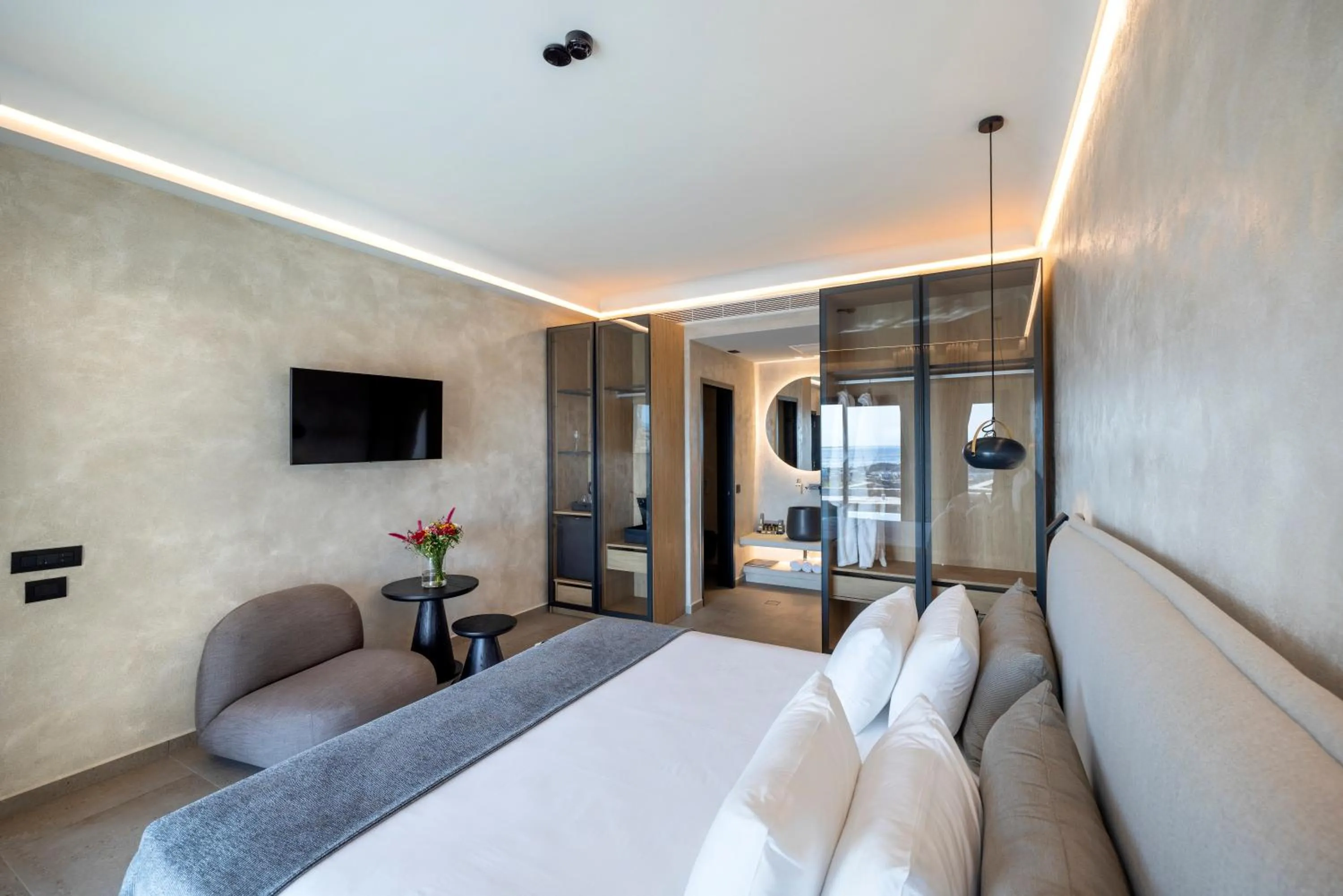 Seating area, Bed in Tropicana Hotel , Suites & Villas Mykonos