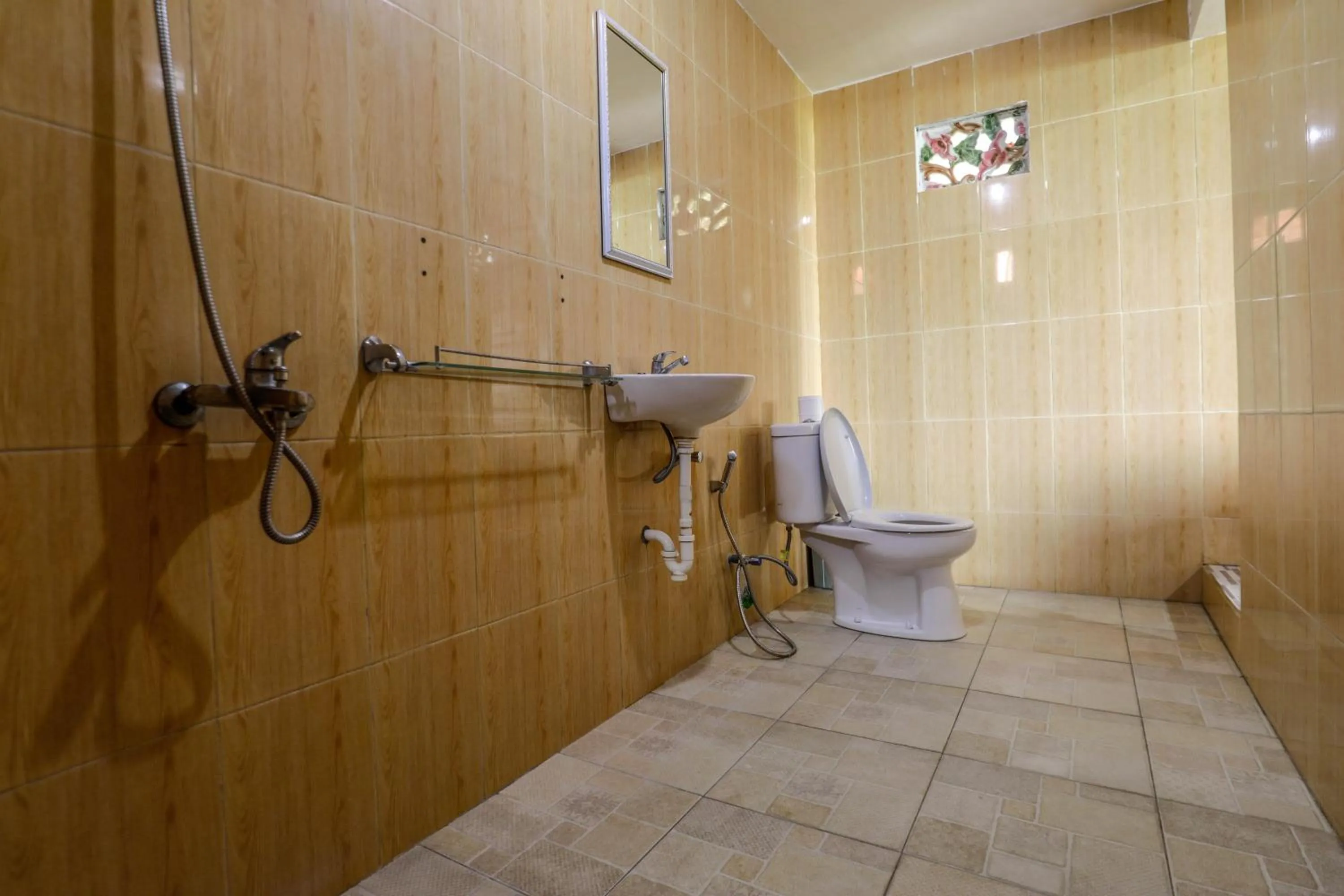 Toilet in Swan Beach Inn