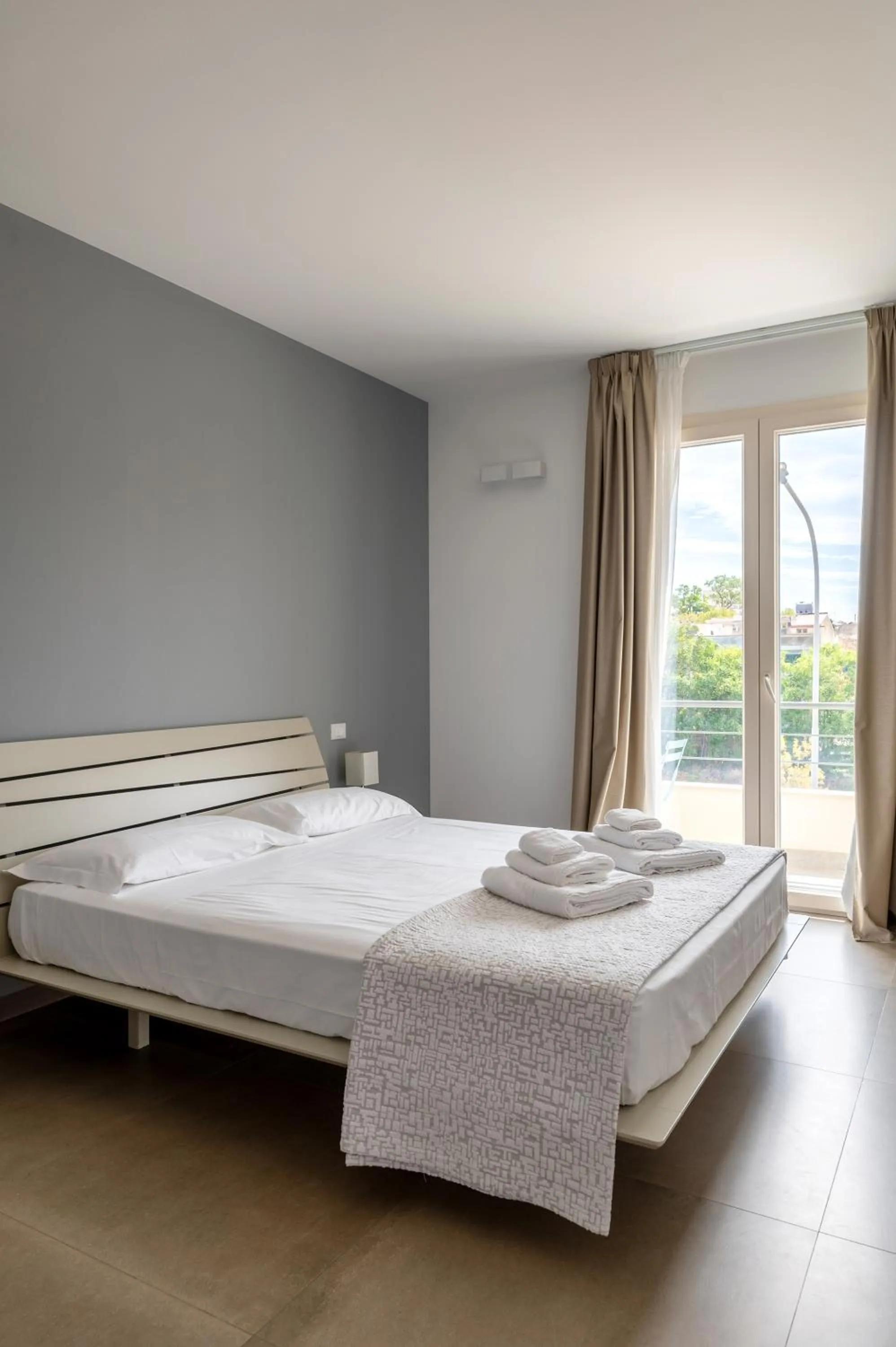 Bed in Serafini Rooms