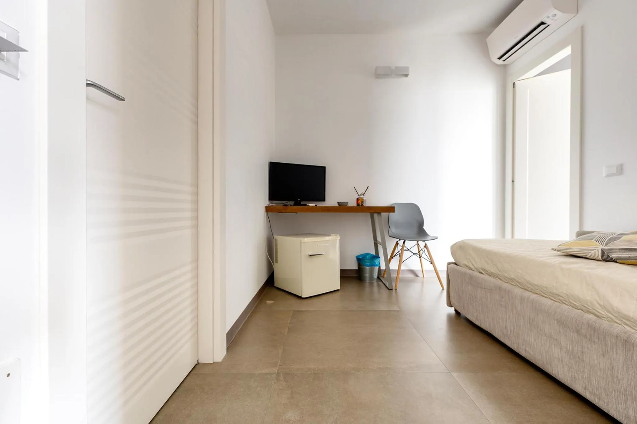 Bed in Serafini Rooms