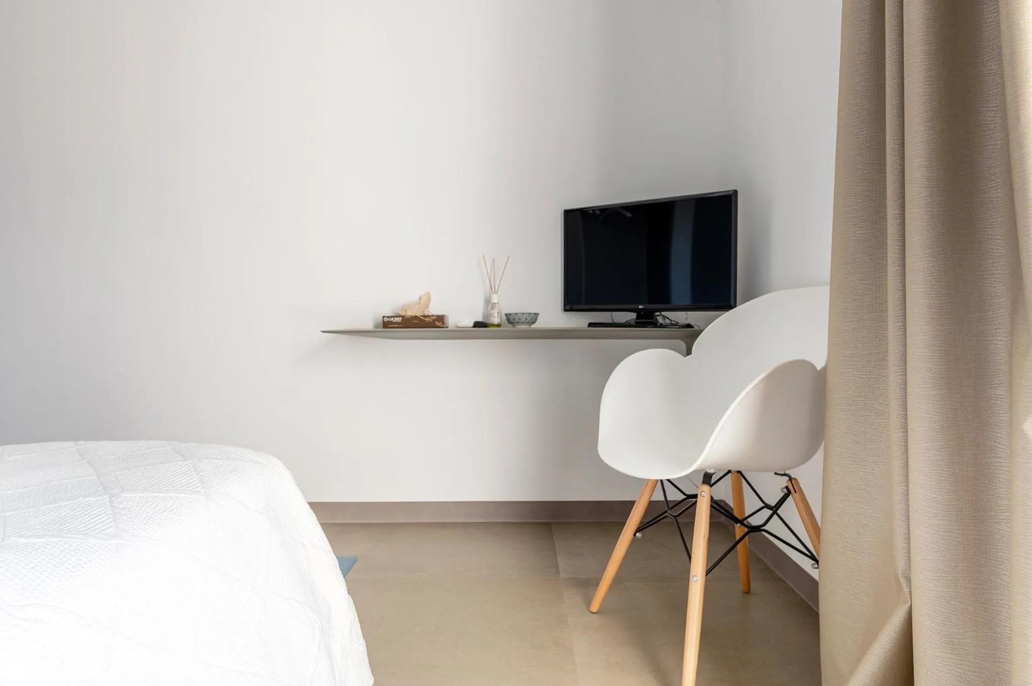 Bed in Serafini Rooms