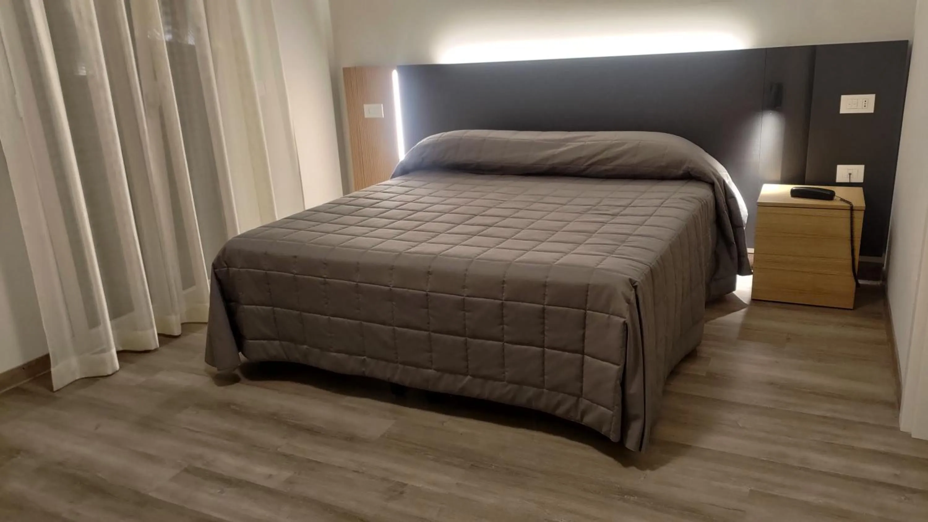 Bed in Hotel Il Caminetto