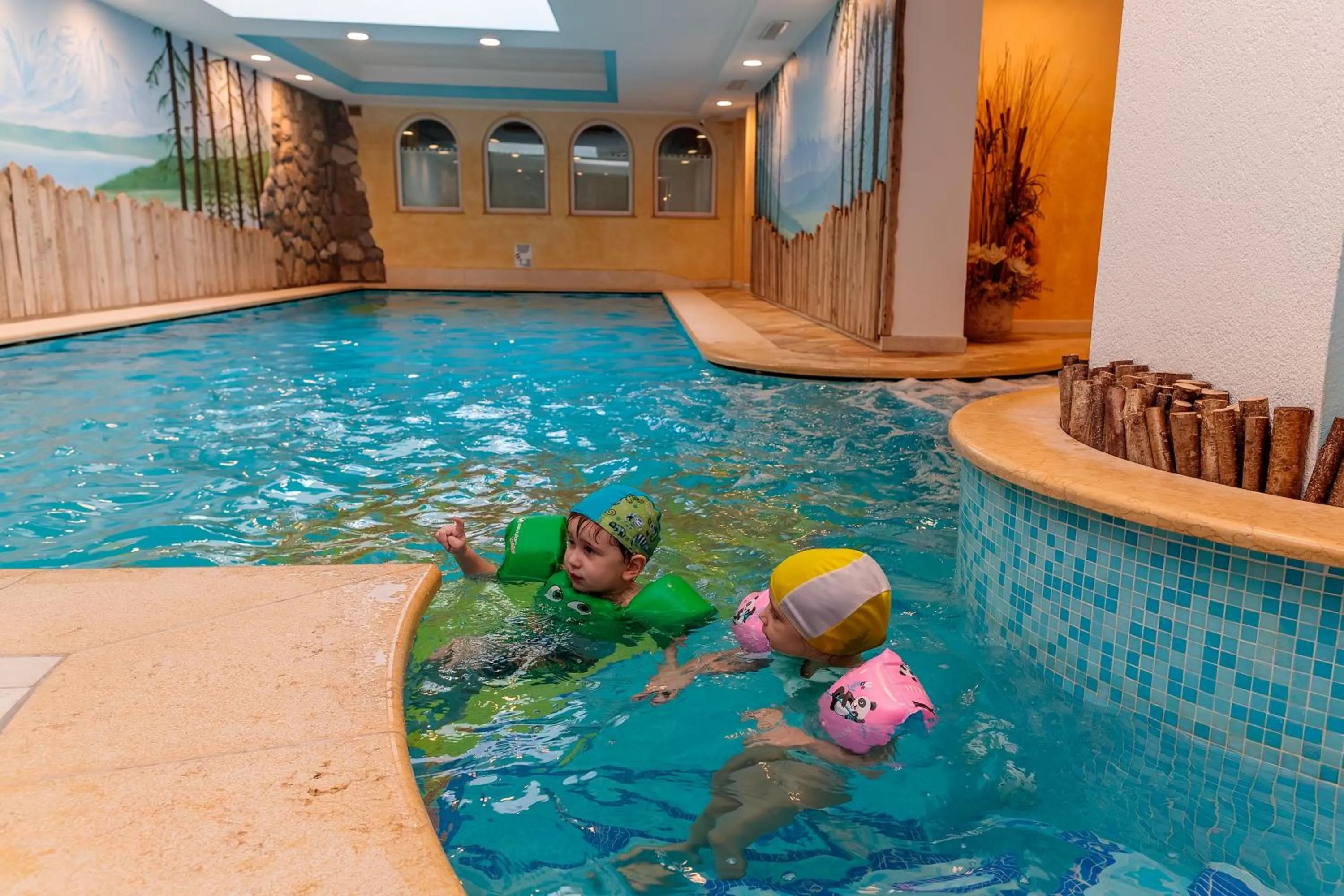 Swimming pool in Albergo Dimaro Wellness Hotel