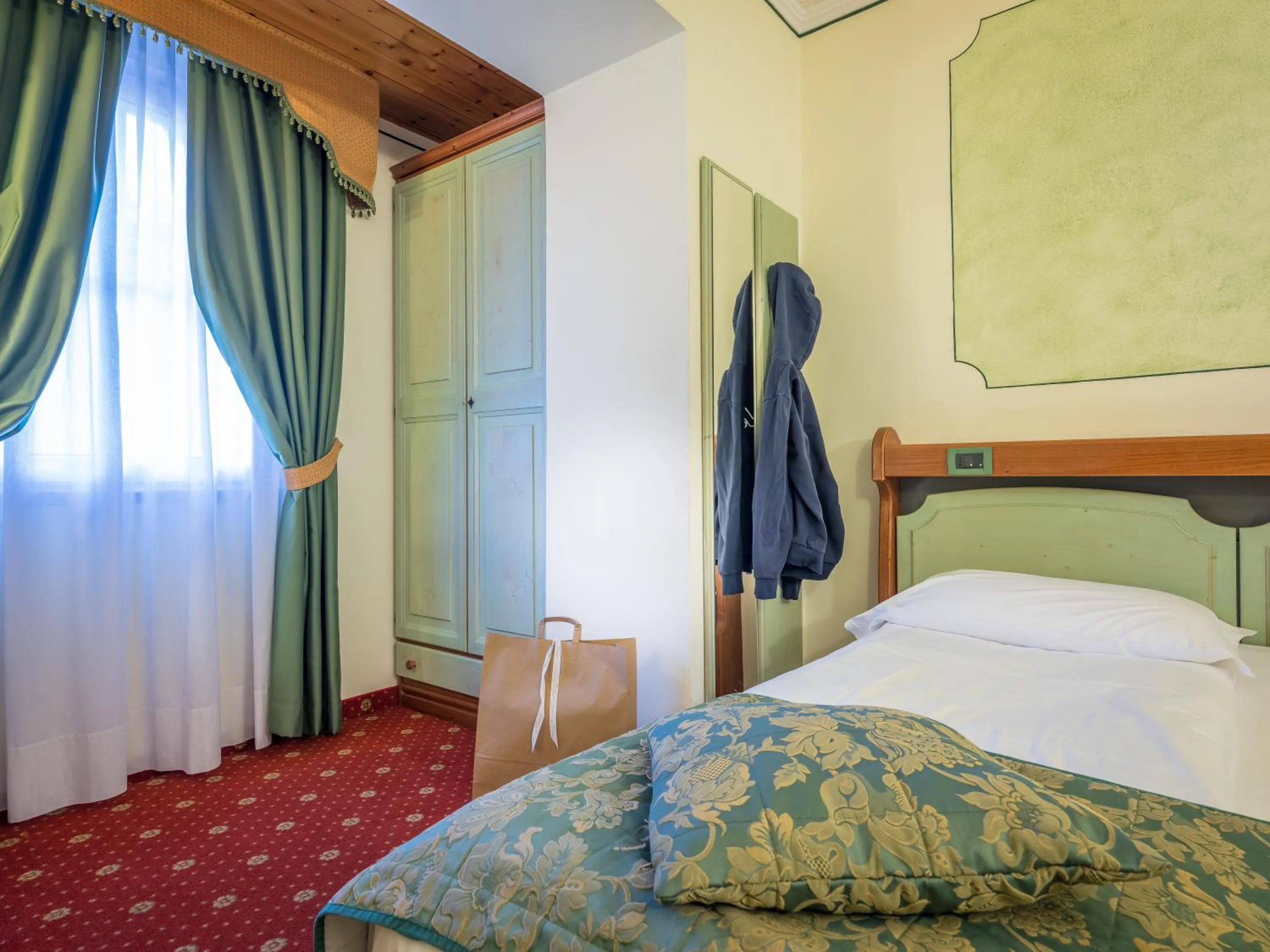 Bedroom, Bed in Albergo Dimaro Wellness Hotel
